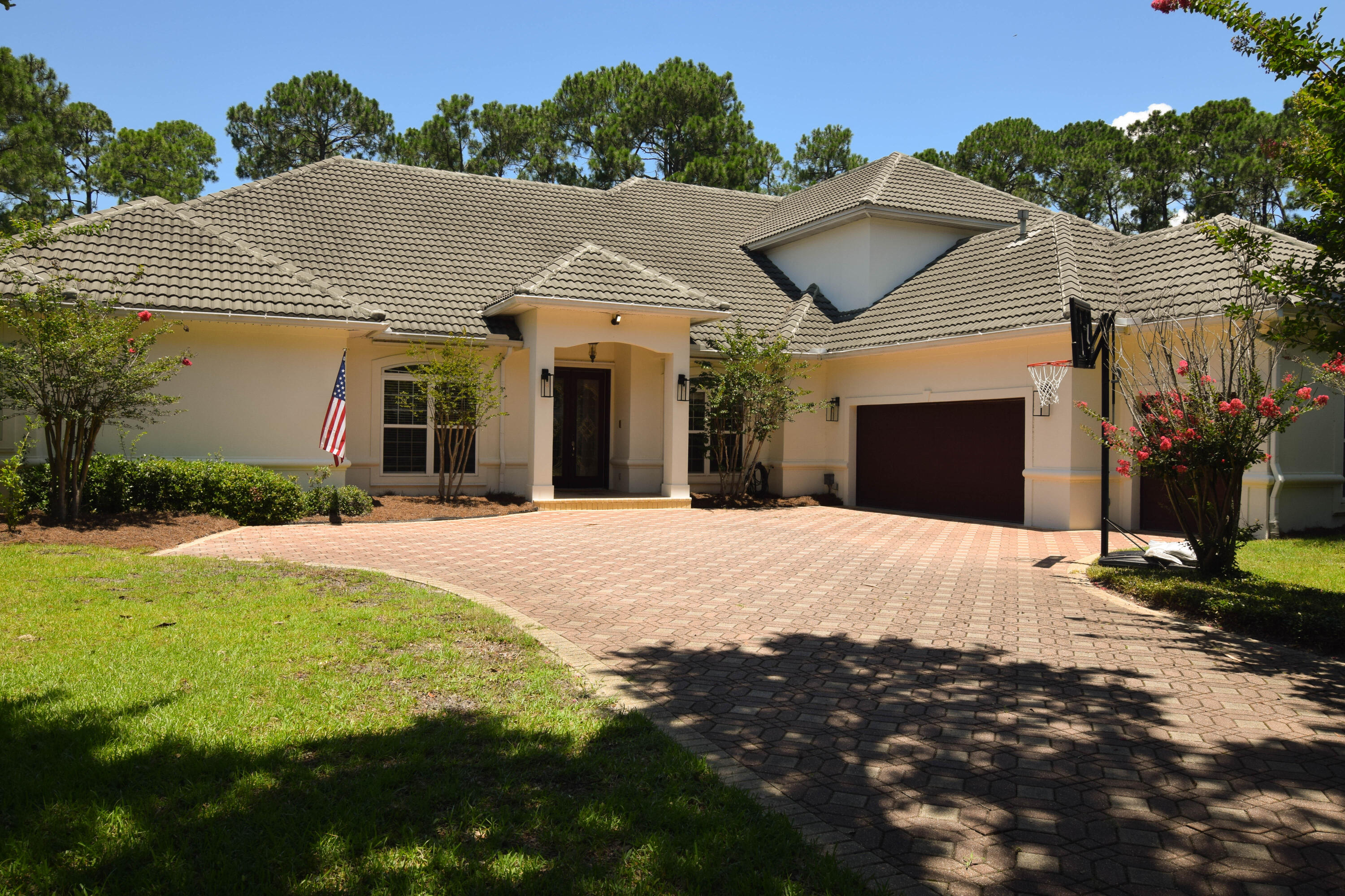 Welcome to 432 Admiral Court, a spacious and beautifully maintained home offering the space you've been searching for but can rarely find in this price range.  Sprawling home with five legitimate bedrooms, a dedicated office space and exercise room are extremely rare in Destin, making this property ideal for larger families, multi-generational living, or anyone needing flexible space for home offices or guests.

Step inside to discover a bright, open-concept floor plan with soaring ceilings and an abundance of natural light. The kitchen features granite countertops, stainless steel appliances, and a large center island perfect for entertaining. Flowing seamlessly from the kitchen is a generous living area and dining space, all designed for easy Florida living.   The laundry room boasts dual washers and dryers, with sink and plenty of added space.

The primary suite is a private retreat, complete with a spa-like bath, dual walk-in closet, and peaceful views. Four additional bedrooms offer versatility, privacy, and ample closet space , a true luxury in this market.

The upstairs features two oversized bedrooms, large gathering room with built in cabinetry and entertaining area.  Two large walk in attics are perfect for storage with easy access year round. 

Outside, enjoy your professionally landscaped yard, a covered patio, pool with heater for relaxing evenings, and the friendly feel of a cul-de-sac street.   Regatta Bay is a serene, gated community that seamlessly blends golf and boating, offering a lifestyle that is truly unparalleled! The essence of the Regatta Bay Lifestyle revolves around convenience, allowing residents to easily access numerous enjoyable destinations within minutes via golf cart, including the beach! Within the community, residents can indulge in golf, swimming, tennis, pickleball, parks, playgrounds, the Regatta Bay Clubhouse, Legendary Marine, and Legendary Yacht Club. Furthermore, Regatta Bay features a private road that leads directly to the Destin Commons, where an array of popular retail stores for both men and women awaits, alongside a diverse selection of restaurants, Whole Foods, Bass Pro, Lowes, an AMC movie theater, and Uncle Buck's Bowling-all easily reachable by golf cart. Regatta Bay is centrally located offering easy access to the airport and only a few miles from Northwest Florida's finest hospital.