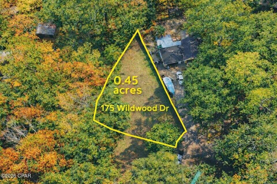 Discover Old Florida charm at 175 Wildwood Dr, Freeport, FL. This nearly ½-acre cleared lot sits at the end of a quiet street in the Black Creek area, offering excellent privacy and a peaceful canal setting. Surrounded by mature live oaks and magnolias, the property is just steps from Live Oak Landing and provides a serene natural backdrop. Located in fast-growing Freeport, this lot offers both tranquility and future potential, with convenient access to South Walton and just a 20-minute drive to Blue Mountain Beach. An ideal opportunity to build your dream home or getaway in a beautiful, private setting.