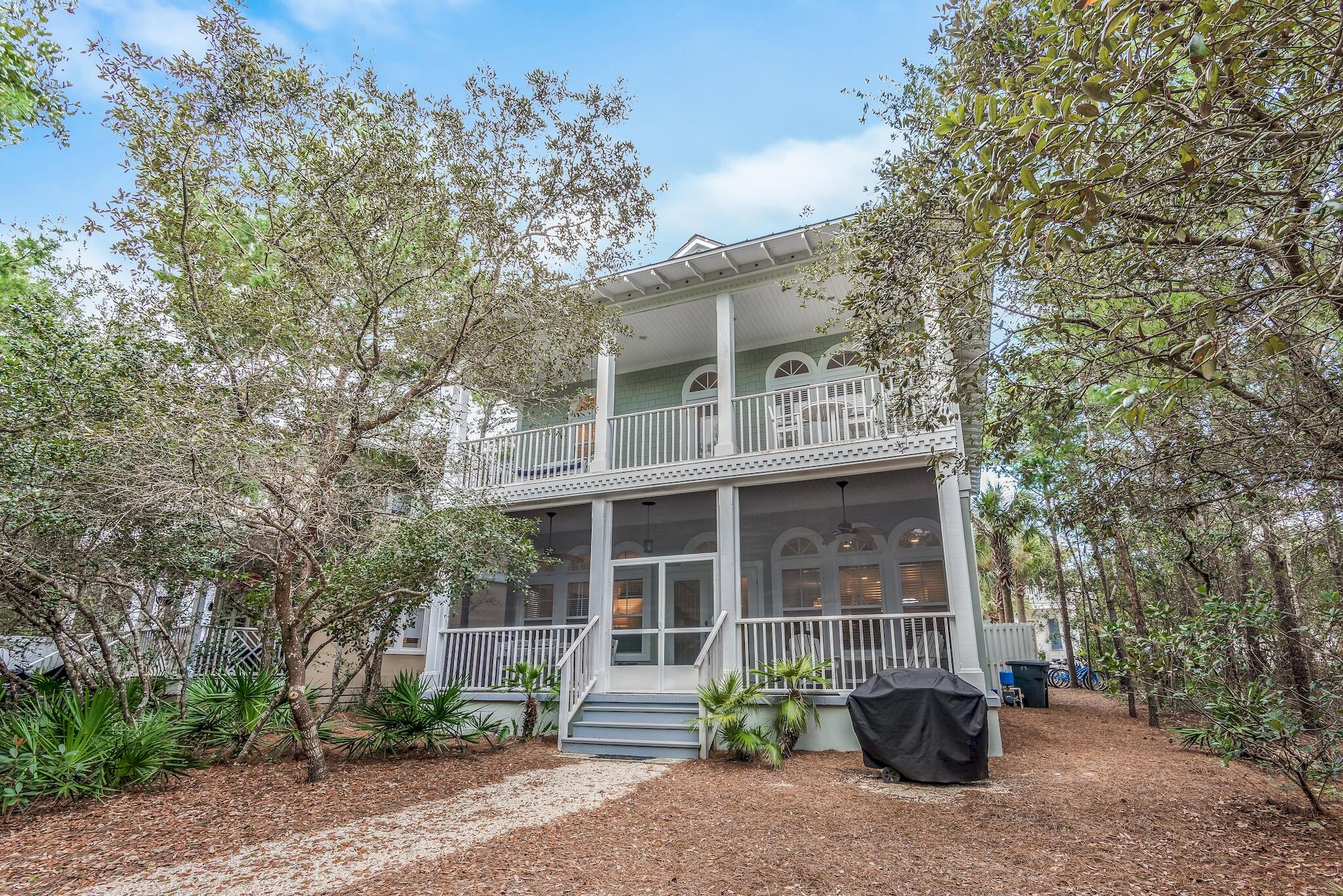UNDER CONTRACT WITH 72 HOUR KICK OUT IN EFFECT. Rental projections of $118k. $93k booked for 2021. Nestled between Alys and Rosemary in the community of Seacrest Beach is the serene, coastal cottage surrounded by lush landscaping and walking trails providing endless privacy from the screened porch. This two story home offers peace and tranquility in a beach retreat with balconies from every room upstairs and the comfort of a guest bedroom on the first floor. Enjoy the 12,000 sqft lagoon pool of Seacrest Beach, convenience of the community tram with deeded beach access and plenty of restaurants and shops nearby. Offered furnished and turnkey with a new HVAC installed (second level) this year. With projections exceeding $115k this is sure to make memories and a sound investment.