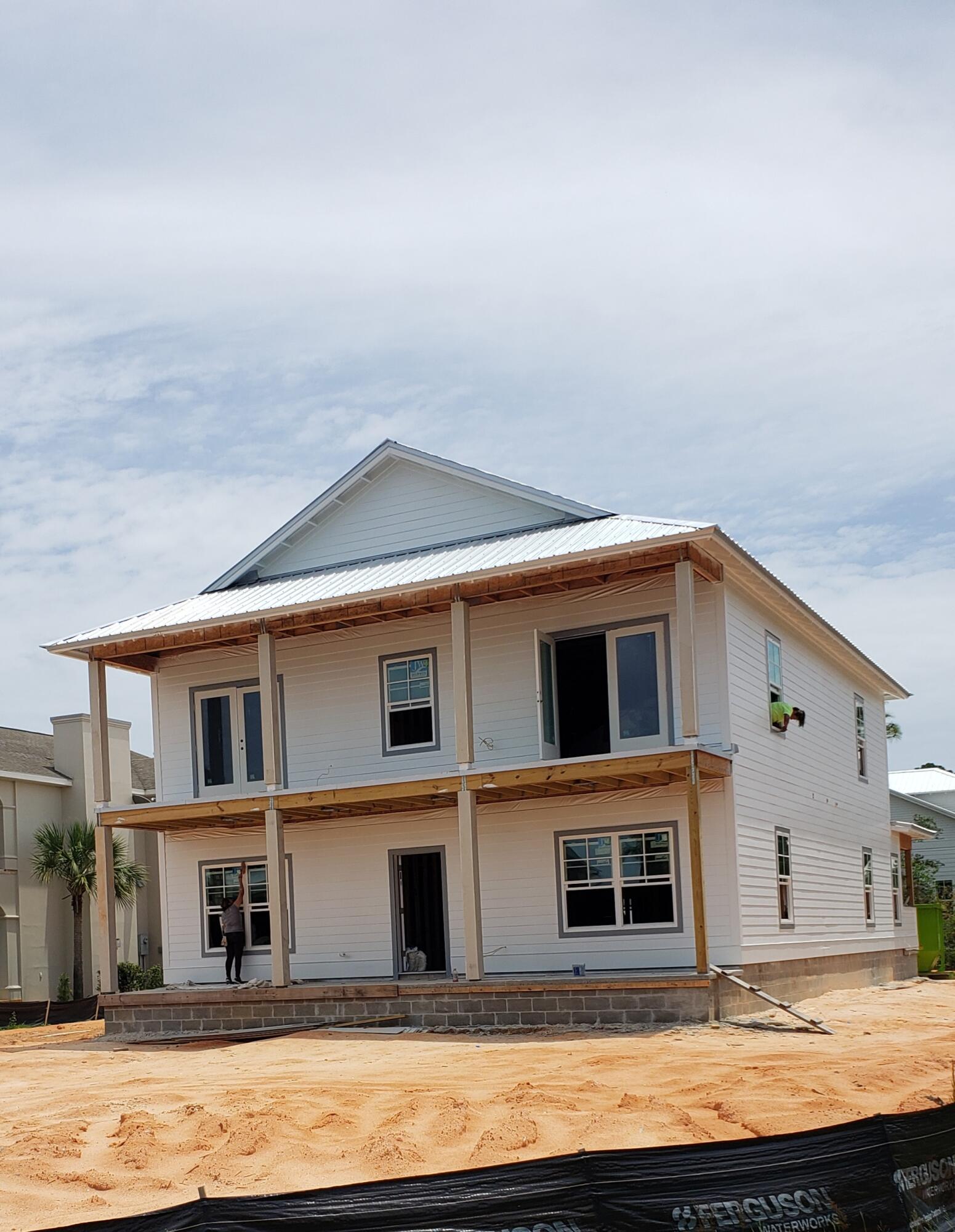 New Custom-Built Home with special attention to detail. First floor has an open kitchen, dining room and living room. The kitchen has quartz countertops, a large island, a Microwave, an Oven, DW, & Refrigerator. One of the master suites and bathroom is located on the first floor. It has a very spacious walk-in closet and a tiled shower. One other bedroom is on the first floor.  The second master suite and bathroom are located on the second floor and offers a large walk-in closet and tiled shower. The master suit on the 2nd floor has double doors that open to the balcony that overlooks the bay. In addition, the 2nd floor offers a loft area with a wet bar that also opens to the balcony that overlooks the bay. Two other bedrooms and one more tiled bathroom is on the 2nd floor. 
add. info The first floor will have shiplap along with the stairway, the loft area, and one wall of each bedroom. The home will have Cali Vinyl flooring throughout. The property has a detached garage with a room above that would be perfect for an office space. This home will also come with an outdoor kitchen on the back porch, a beautiful front porch that overlooks the Bay along with both a Bayview and access. This home is walking distance from the water. Call today for more information.