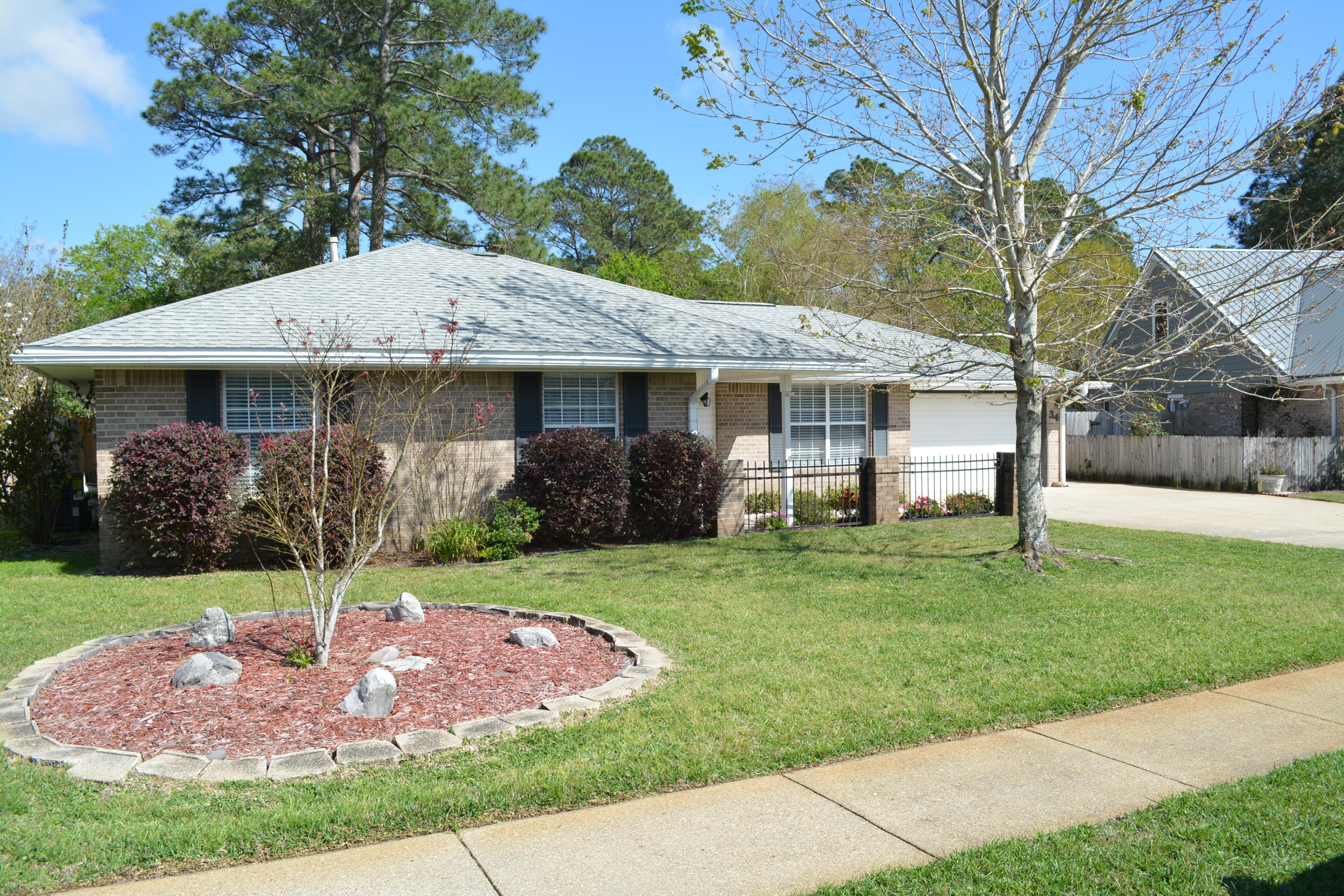 Freshly painted interior with laminate flooring throughout. Extra parking for boat/RV and a fenced backyard that has a covered patio and a storage shed. Newer appliances in the kitchen and all bedrooms have ceiling fans. Available April 10th.
