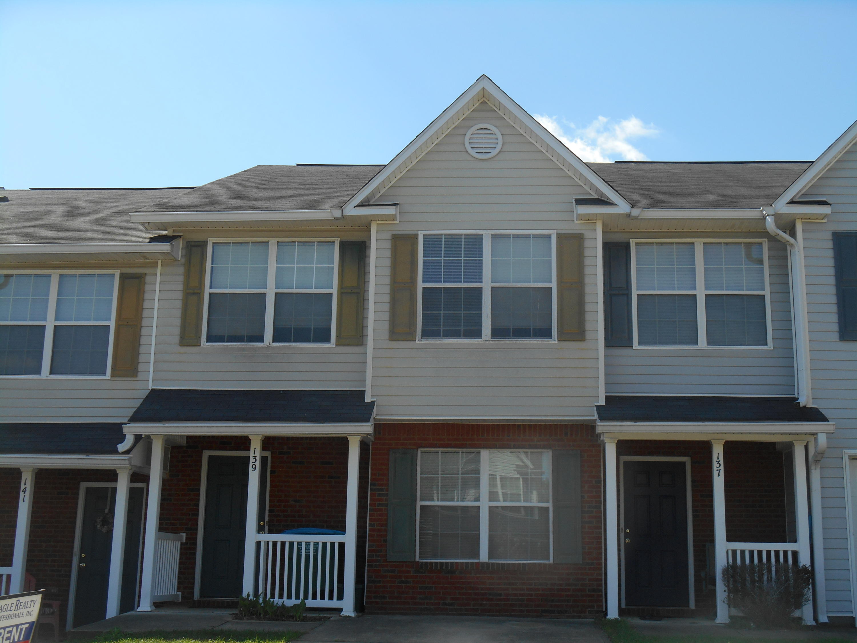 Available NOW. New wood look vinyl plank floors downstairs Nice 3 bedroom 2.5 bath townhouse includes lawn maintenance. The kitchen is open to the living room and overlooks the back patio. Bonus office/den/playroom downstairs versus a garage. This unit has an open green space and a row of wood between next subdivision. Upstairs you will find 2 nice sized guest rooms, full guest bath, large master bedroom suite with walk-in closet and master bath (1/2 bath Powder room downstairs too!). The washer & dryer is upstairs for ease & convenience, no more taking your laundry up & down! Centrally located near Lowes, Wal-Mart, hospital, the bases & many restaurants. Call for showing appointment. Will show on weekends.