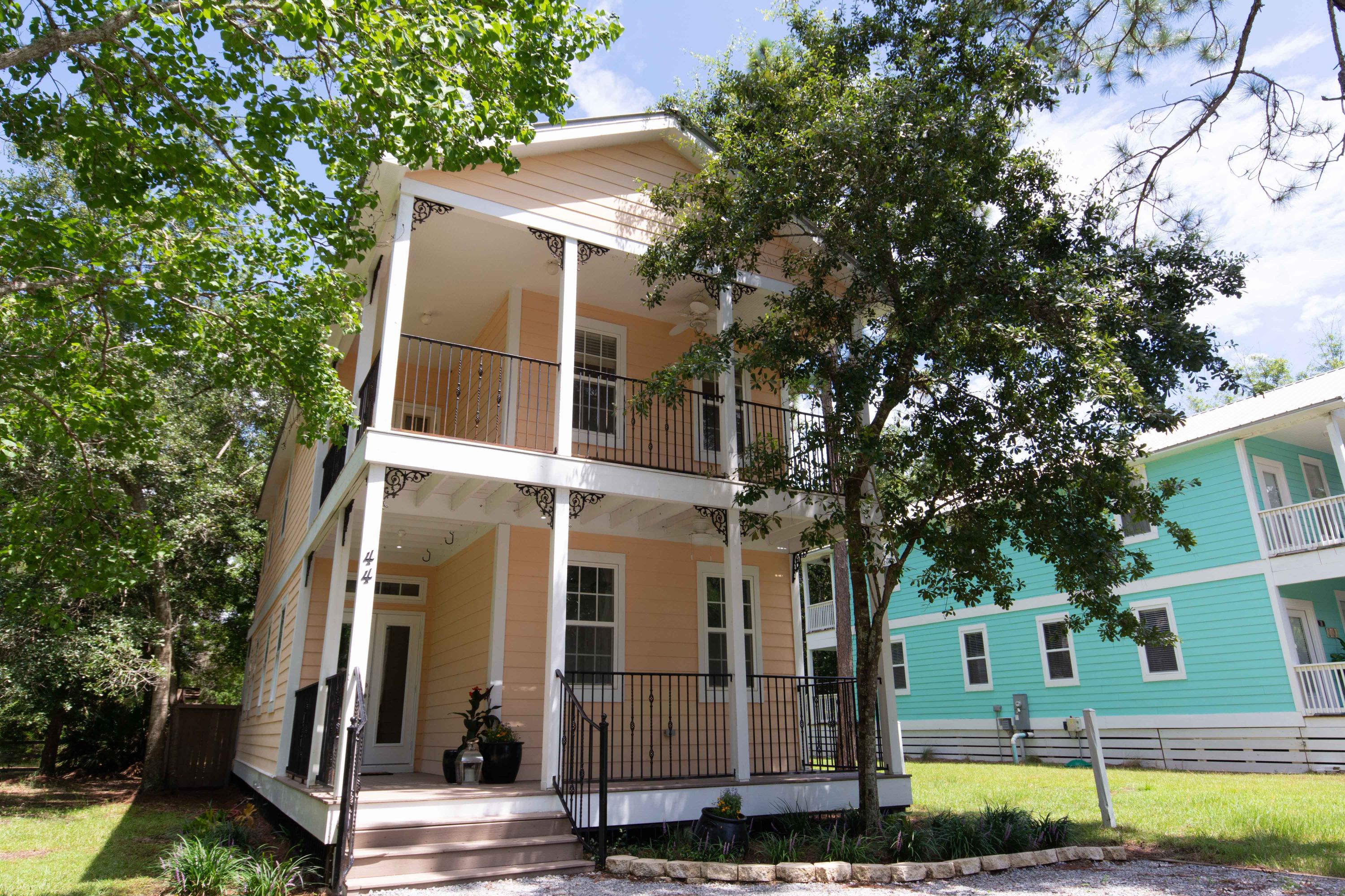 This is a recently renovated 3 bedroom, 3 bath home with a fenced back yard. The home has many recent upgrades including new granite counter tops, stainless steel appliances, new floors throughout main floor living areas. This home is perfectly situated in Santa Rosa Beach just off 393, near Cessna Landing Boat Launch. When you walk through the front entry hall of this home you are greeted by an open floor plan with the kitchen open to the living room and dining area. A perfect layout for entertaining guests. There is a first floor bedroom and bath to the right of the front door, and then the spacious master suite and 2nd guest room with an on suite bath are upstairs.
The master bedroom has a private balcony that overlooks the back yard, and features a walk in closet and a large bathroo with a double vanity and separate shower and tub.