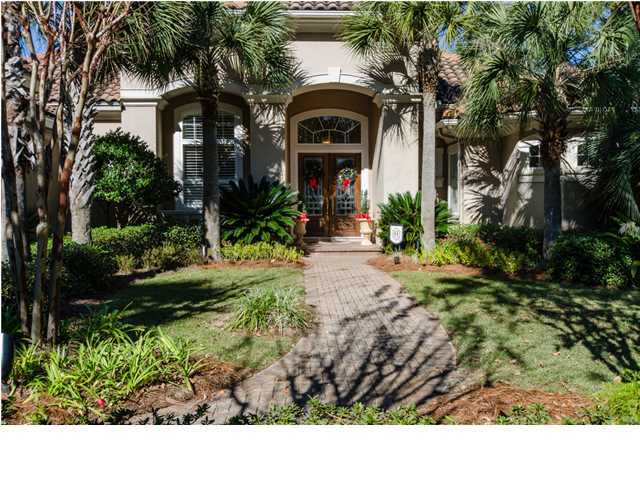 This unfurnished lakefront home has exceptional views of the Golf course and many custom features throughout. An over-sized Master Suite is located on the first floor with cozy sitting area and access to lanai, spacious master bath features double vanity, garden tub, separate shower, and walk-in closets. As you enter the foyer it opens to the view of the covered lanai, complete with pool, outdoor kitchen, and bar, such a wonderful place for entertaining! Several living spaces including a formal living with fireplace, formal dinning, with custom built-in buffet, the kitchen features large island, granite counter tops.