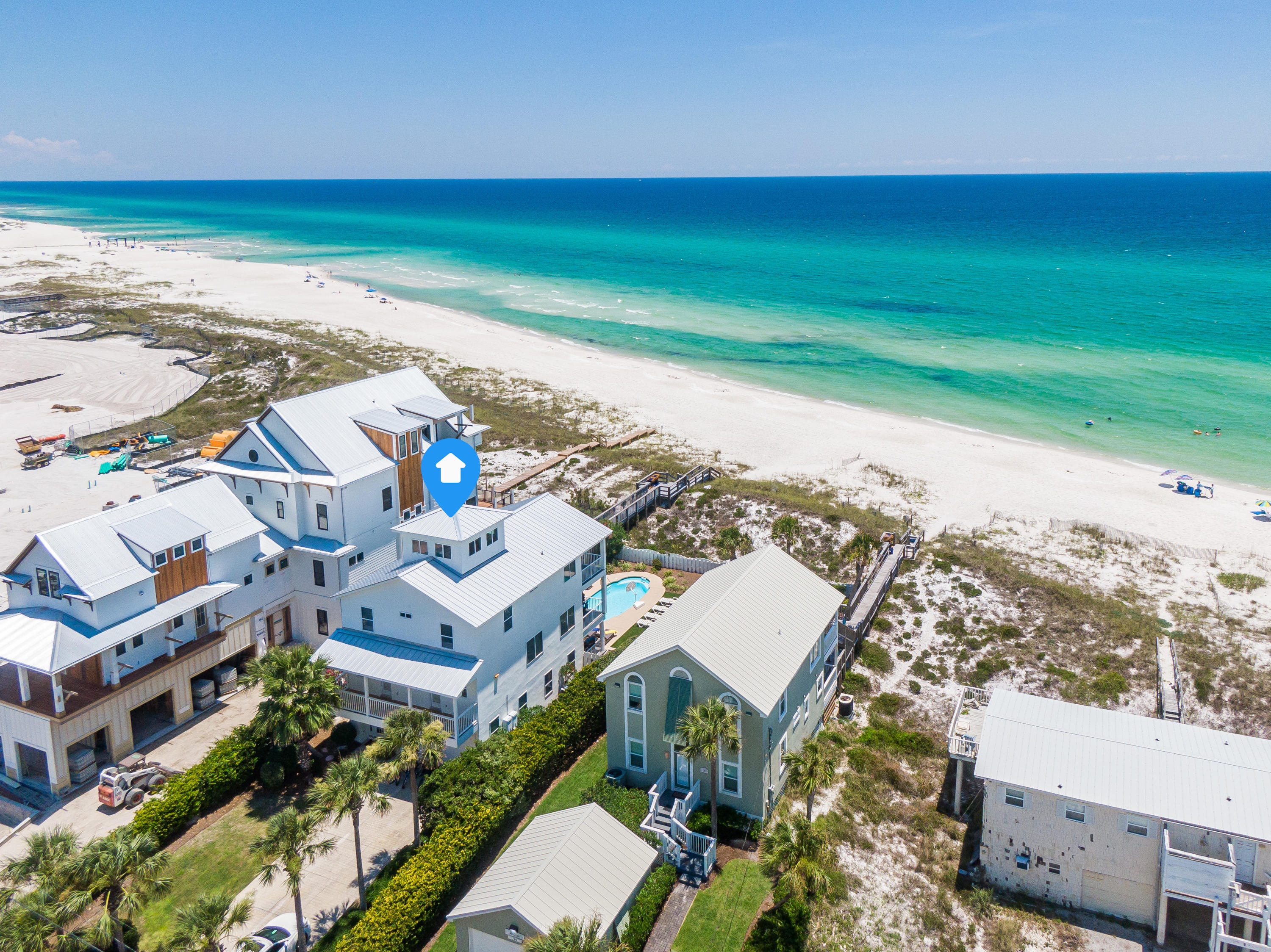 Spectacular Gulf-Front Compound. Fully-Renovated home boasting Strong Rental Income of $300,000 for 2020 and $292,000 on the books for 2021.

As you enter through the front door there's a beautiful shiplap accented foyer and to your right you'll notice a wide open game room with a ping pong table, arcade games, and two adjoining bedrooms, one of which is a bunk-room, making this the perfect hangout space for the kids. 

Moving along to the 2nd level offers breathtaking views of the gulf that begin to shine bright as you ascend to the top of the staircase. 

This 2nd level holds light-filled living spaces with beautiful coastal decor, a wide open kitchen with stainless steel appliances, a dining room with stunning gulf vistas, and a large guest bedroom with ensuite bath. Also on this level is a wonderful and spacious balcony overlooking a private gulf-front pool and offering abundant space for entertaining and gathering. 

Continuing on to the 3rd level you'll find 3 additional bedrooms, including 2 master suites and another bunk room. 

And of course there's a gulf-facing balcony on this level where the views are absolutely spectacular. 

This property has a gulf-front pool with plenty of spots for lounging in the sun, a private boardwalk to the beach, PLUS 54 feet of private beachfront belonging exclusively to this residence.

Location is top-notch with quick access to wildly popular 30A favorites like Rosemary and Alys Beach, shopping and restaurants at 30Avenue, and less than 30mins from Panama City Beach's international airport. 

This home would make a tremendous investment property or 2nd home. Call today for your private tour.