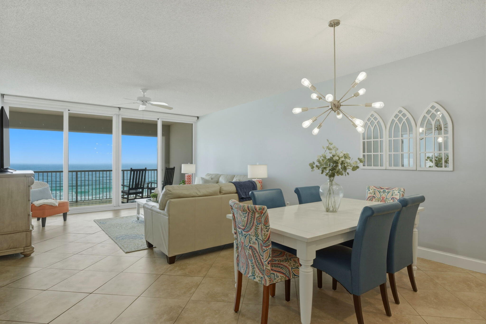 Welcome to coastal living at its finest, where emerald waters, sugar-white sand, and breathtaking Gulf views take center stage. This stunning beachfront condominium offers some of the best views on Navarre Beach, overlooking rolling waves, pristine shoreline, and the iconic Navarre Beach Pier--the longest fishing pier in Florida.

Situated on the highly sought-after fifth floor, this residence captures the perfect vantage point: high enough for sweeping, unobstructed views, yet low enough to stay connected to the shoreline and natural beauty below. The views truly are just right. Inside, you'll find an open and airy floor plan featuring two spacious bedrooms and two full bathrooms, designed to maximize comfort and coastal views. The kitchen opens seamlessly to the living area with a generous bar top--perfect for entertaining while enjoying Gulf and pool views. Double sliding glass doors in both the primary suite and living room lead to an oversized balcony, creating effortless indoor-outdoor living.

This condo has been immaculately maintained and has never been used as a rental, though it is rental-friendly. Rental projections are estimated as high as $70,000 annually, offering excellent income potential for investors or second-home buyers.

The monthly HOA fee covers groundskeeping, elevator maintenance, pool upkeep, and portions of insurance, allowing for truly low-maintenance beachfront ownership. Enjoy private beach access via a beautiful wooden boardwalk complete with an outdoor shower and pergola, ideal for relaxing with family and friends after a day on the sand.

The home conveys fully furnished, with only a few exclusions--please inquire for the full list.

Conveniently located just over the Navarre Beach bridge, you're moments from local restaurants, boutiques, shopping, and endless coastal activities including dolphin watching, parasailing, fishing, and sunbathing.

This is a rare opportunity to own a pristine, turn-key condo with unbeatable views, income potential, and the laid-back luxury Navarre Beach is known for.