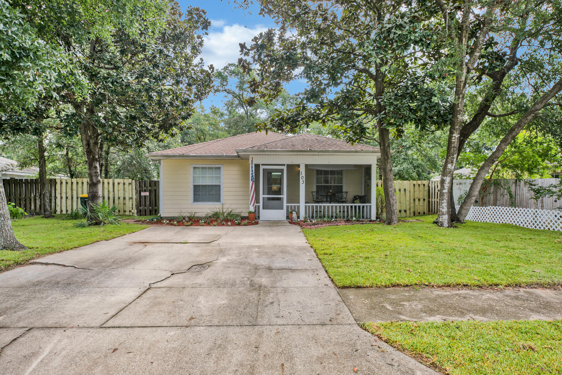 Adorable 3 bedroom, 2 bath home in the heart of Fort Walton Beach. This open floor plan provides split bedrooms, a fabulous kitchen, breakfast bar, & flow through living/dining room. There's also a nice size laundry room with access to the large  privacy fenced-in back yard.  Enter the home through a quaint and welcoming screened in front porch. The master bedroom boasts a large walk-in closet and a spacious bathroom. The property is 100% handicap accessible with 36'' doors, large walk-in shower in the 2nd bath, and wide hallways. The private backyard is so big, it feels like country living in the middle of the city. Beautiful landscaping with mature lush oaks, a gorgeous fruit producing orange tree, and a 10 x 12 Tuff Shed storage unit with a loft (valued at $8,000.00). Centrally located less than a mile from the grocery store, gym, shopping, restaurants, entertainment, fresh seafood market, parks, and so much more. This great home is a hidden little gem not to be missed. 

Buyer to verify all dimensions and information!