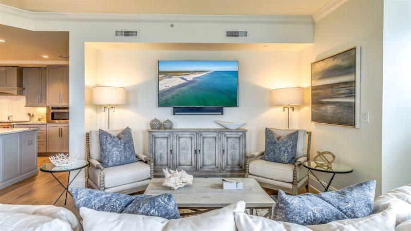 The Georgetown is the newest building constructed on N Barrett Square in the heart of Rosemary Beach. This top-floor unit is a luxuriously appointed 3 Bedroom + Bunk Room, 3 bath unit with an open and spacious floor plan, wet bar, private balconies and luxurious kitchen. Finishes include Wolf 36'' dual fuel range with griddle, Sub-Zero French door refrigerator and wine cooler, wire brushed Oak hardwood floors throughout, frame-less glass showers and Calcutta Gold Marble countertops throughout. Cozy up in the master bedroom furnished with a king size bed and a private balcony. Attached is an en suite with dual vanities, frame-less glass shower, and soaking tub. In the first guest bedroom you will keep snug in a queen size bed. Connected to this guest bedroom you will find another READ MORE. en suite equipped with a single vanity and a tub/shower combination. Relax in the second guest bedroom assembled with a queen size bed and a charming sitting area for two. Shared with the bunk area, the guest bathroom consists of a single vanity and a glass enclosed shower. This condo also features a large laundry room with utility sink & storage, deeded conditioned storage room, coded building access and deeded covered parking space. Information contained within this listing such as square footage, is deemed to be accurate but is not guaranteed. Buyer to verify