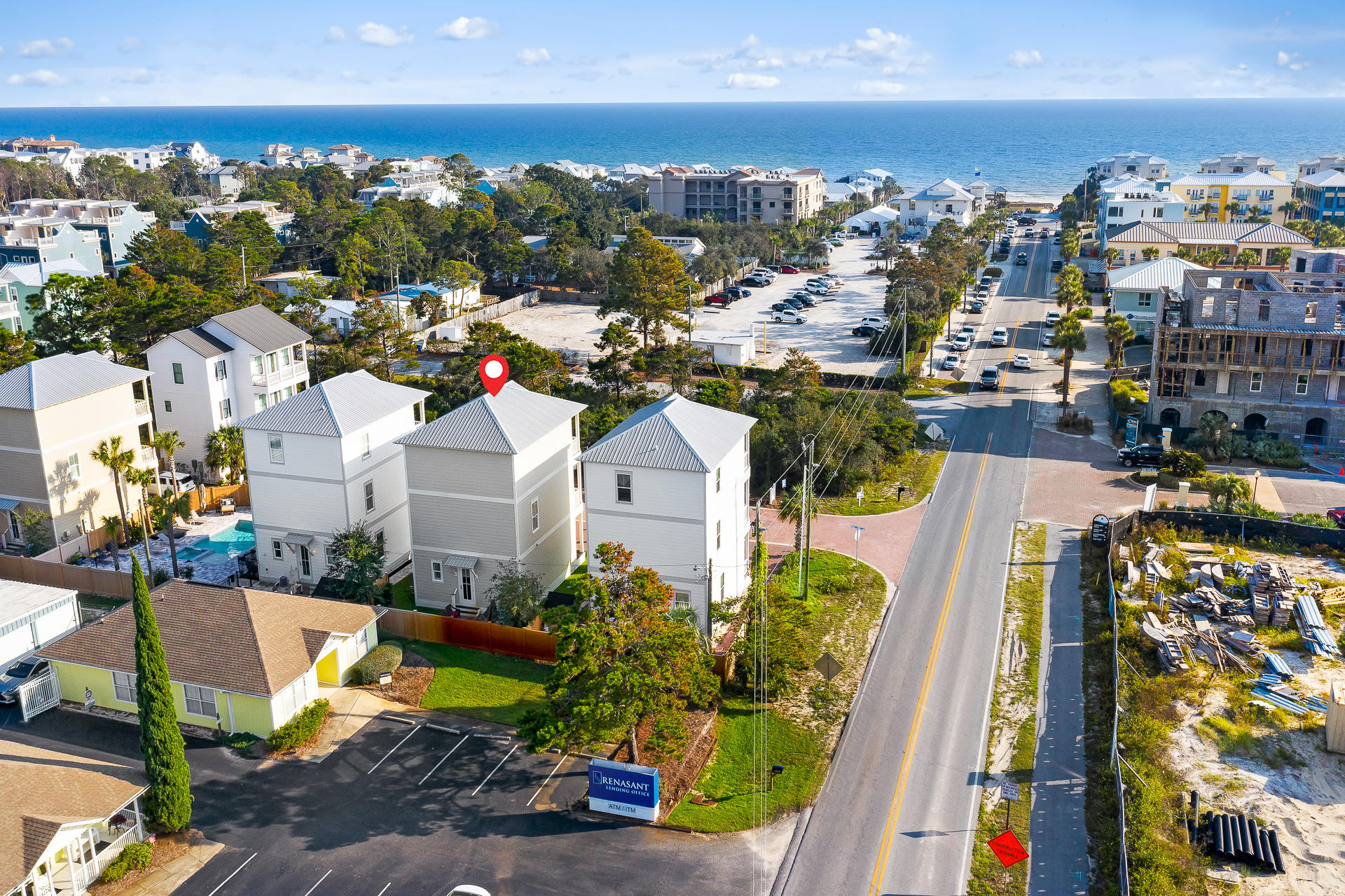 Close to the beach, gulf views, and no HOA! Located near Ed Walline public beach access, Gulf Place and many other shops and restaurants, this house is a great second home or rental. Graced with quartz countertops and wainscoting throughout, this home is extremely well constructed with several high-end finishes! The first floor features an open floor plan with kitchen, dining and living area. Completing the first floor is a half bath and laundry room. The second floor has a bunk area, master bedroom with a private balcony and an ensuite bathroom with a huge walk-in closet. The third floor features 2 bedrooms and a Jack and Jill bathroom.
