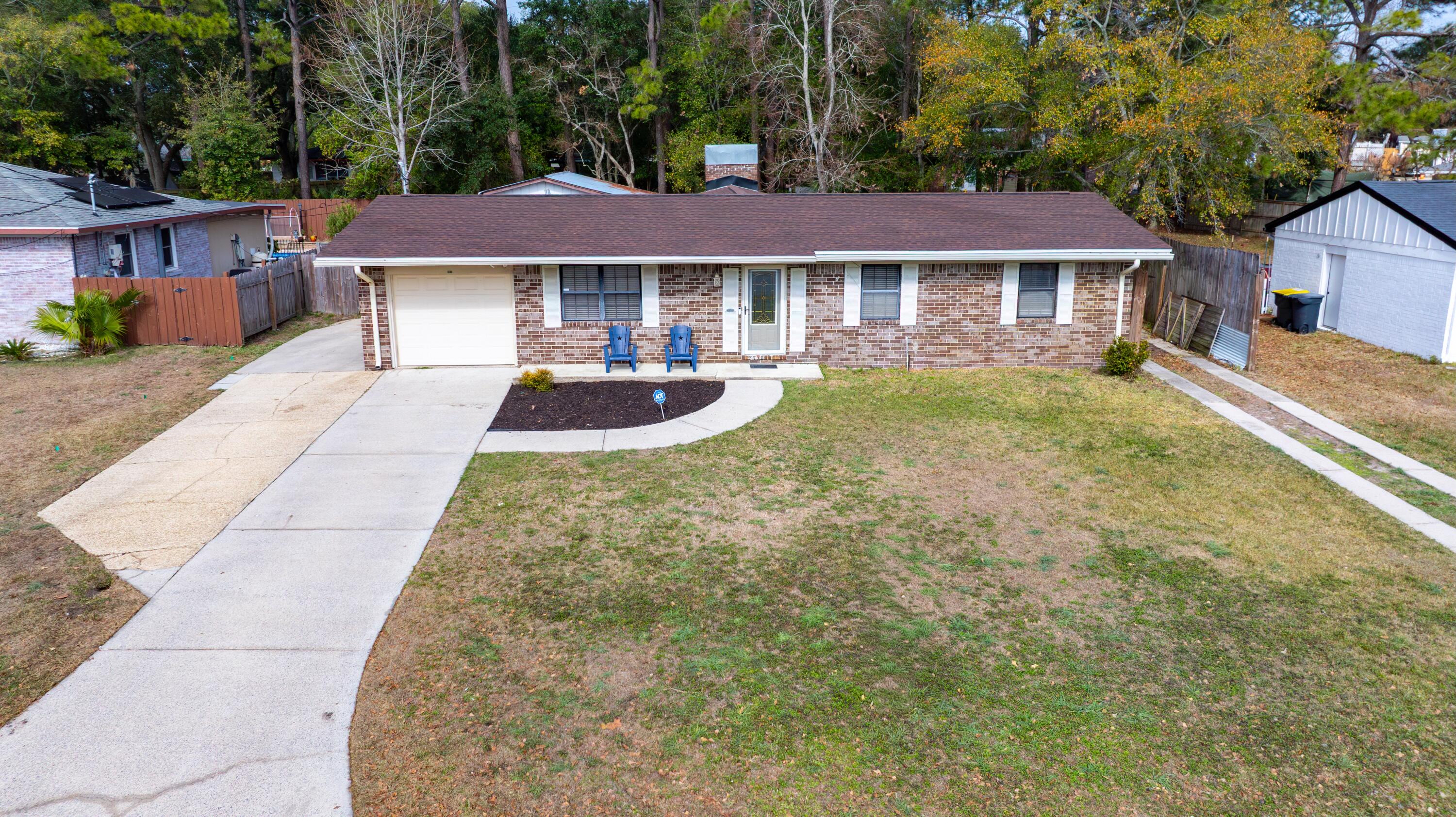 *PRESENTED WITH STAGING FURNITURE* Welcome to 207 NW Martisa Rd - this 3-bedroom, 2-bath home with a bonus room is located in a well-established Fort Walton Beach neighborhood and offers a strong combination of recent updates, functional space, and convenient access to local amenities. Major system improvements include a new 2026 Roof, new electrical panel (2023), HVAC system replaced in 2024, and a hot water heater replaced in 2025, providing added peace of mind. Both bathrooms feature newly installed venting (2023). The remodeled kitchen includes new cabinets (2025), an electric range (2024), dishwasher (2024), and a new water line to the refrigerator (2024).  Fresh paint throughout most of the home creates a clean, move-in-ready feel. The main living area is complemented by a wood-burning fireplace adding warmth and character.

Outdoor features include RV or boat parking, a fully fenced backyard, and an outdoor workshop with a covered porch, ideal for storage, hobbies, or additional workspace. Conveniently located just minutes from Downtown Fort Walton Beach, Uptown Station, John Beasley Park, Fort Walton Landing, Emerald Coast beaches, and nearby water access.