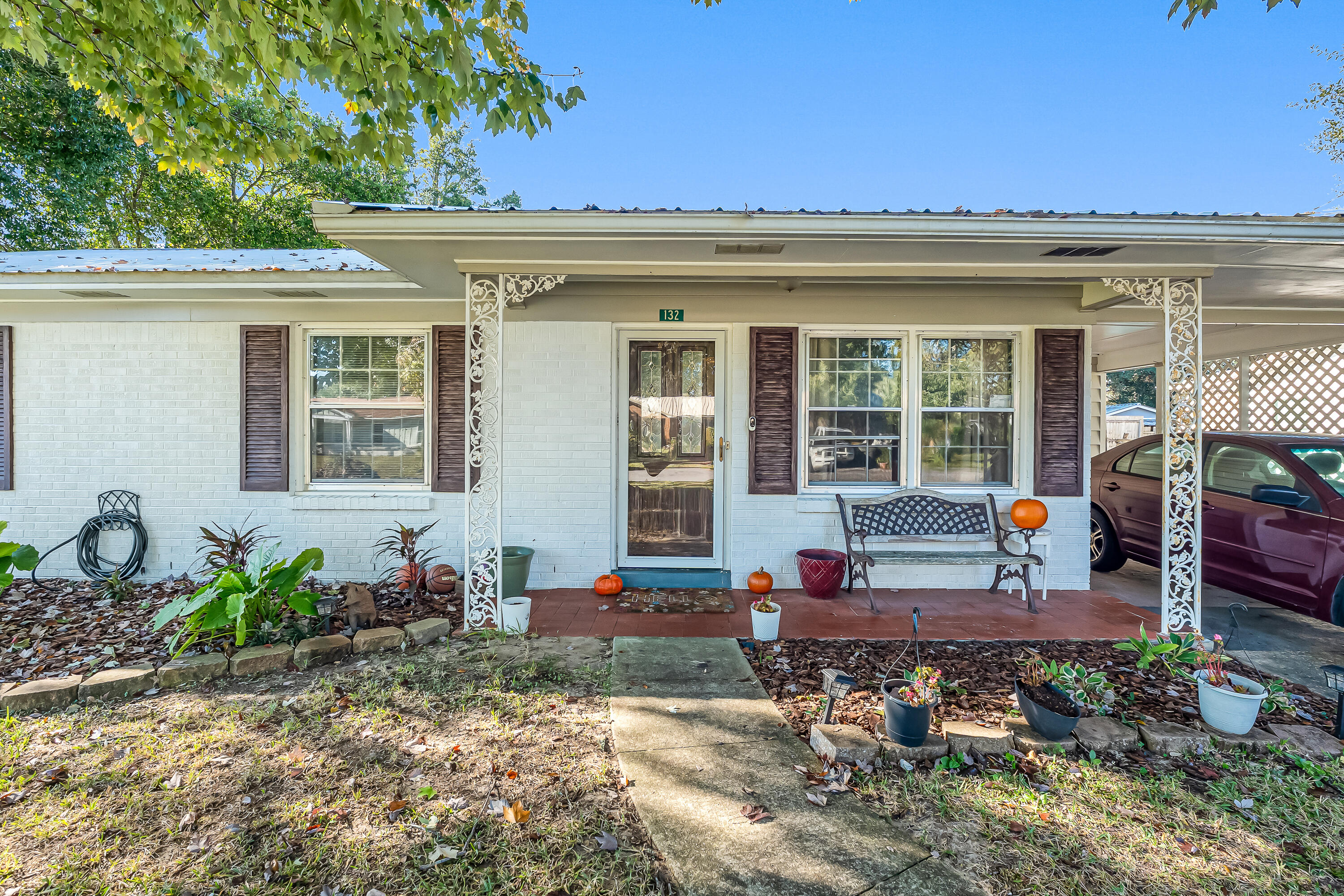 Kick-out clause, Closing cost assist $5000. Price Drop.   Welcome to this charming 4-bedroom, 1.5-bath home featuring a durable metal roof, a spacious screened porch, and a large backyard perfect for entertaining. One standout feature is the versatile workshop equipped with electricity--that could easily be transformed into a quiet office or creative space with the addition of a window unit. Inside, you'll find an extra-large laundry room & a generous dining area, offering plenty of room for comfortable everyday living. The home is centrally located in the heart of Fort Walton Beach, close to shopping, schools, both military bases, & the beautiful local beaches. Enjoy peaceful mornings or relaxing evenings on the expansive screened porch overlooking the fully fenced backyard. Enjoy peaceful mornings or relaxing evenings in the large screened porch overlooking an expansive fully fenced back yard.  Barbecue or just enjoy outdoor living on the outdoor patio.  Schedule your showing today before it's gone.