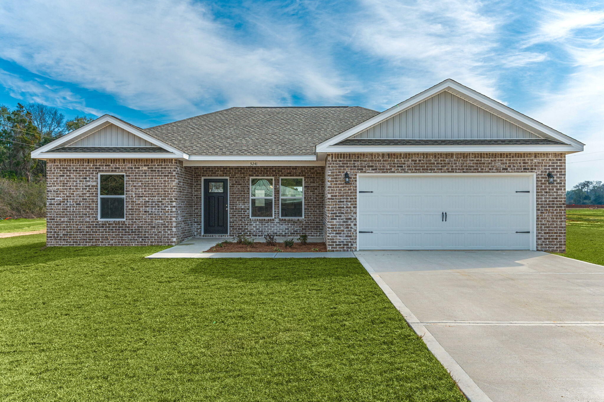 SMALL BUT MIGHTY FLOOR PLAN ON ONE FULL ACRE IN BAKER- ALL BRICK -  with 9' ceilings, Luxury Vinyl Flooring in common areas, carpet in bedrooms, granite or quartz countertops.  Kitchen has stainless steel appliances, work island, pantry, white shaker cabinets, double vanities in owners bath, nice size laundry room.  Recessed lighting, split bedroom floor plan.  Photos of similar home colors and front elevation may vary.