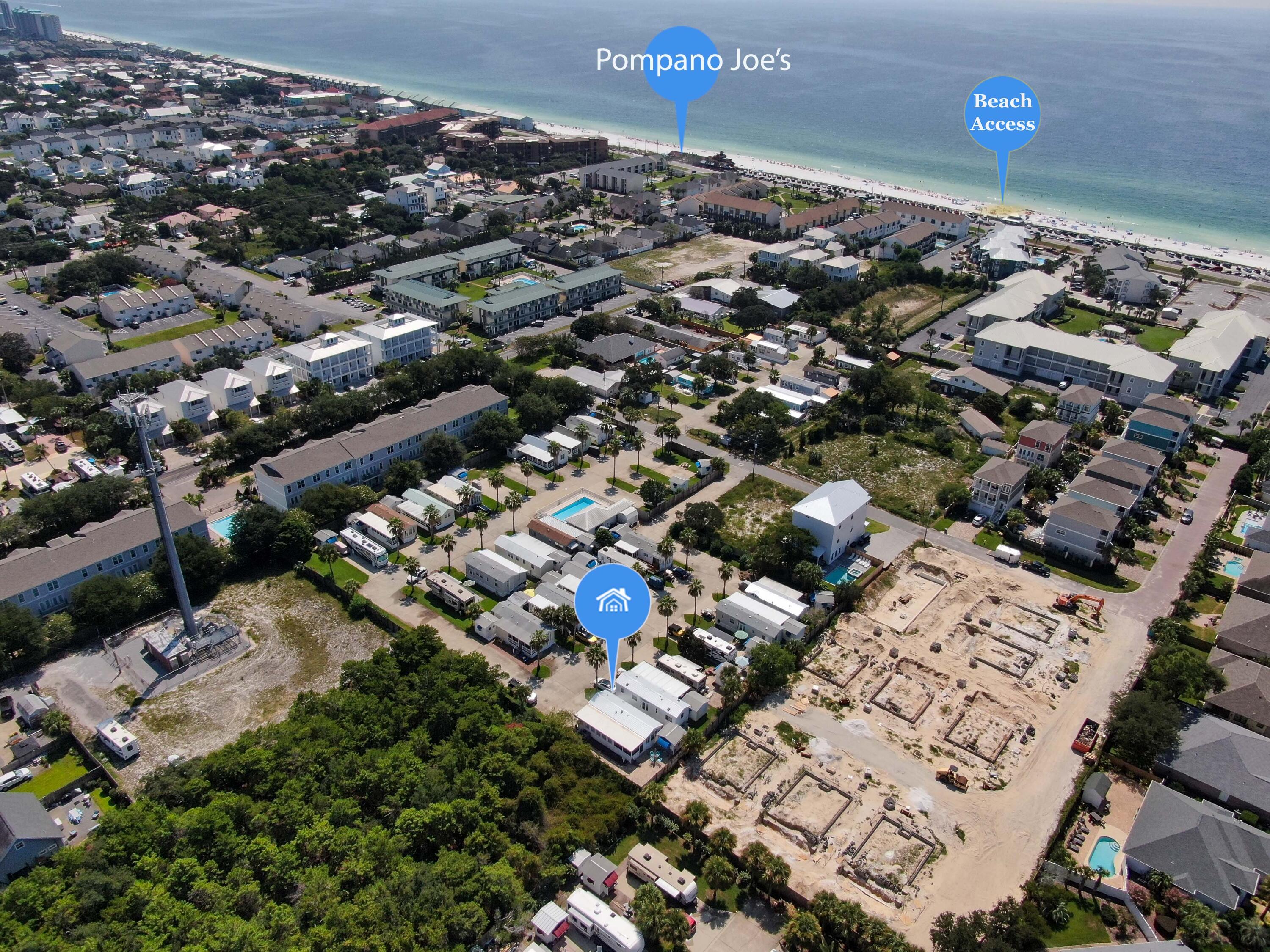 **NEW**  OWNER WILL CONSIDER SOME OWNER FINANCING***

ONE BLOCK FROM THE BEACH AND MIRAMAR REGIONAL BEACH ACCESS...for less than $330,000!  This immaculate manufactured home has 2 bedrooms & 1.5 baths (.5 bath is new!).  
NEW ROOF, NEW A/C, NEW FLOORS THROUGHOUT, NEW HALF BATH.  Comes furnished with appliances, W/D, adjustable beds in both bedrooms, refrigerator in the out building.  Great primary residence or rental property!   Wonderful family friendly neighborhood with well kept lawns, clubhouse, pool & restrooms! Corner lot within the subdivision, offering lots of privacy and 3 parking spaces.  Sit out on the screened-in patio in the corner, or enjoy the large, paved outdoor area.  Includes a 10'x10' finished out building for storage, etc.  
 Don't miss this opportunity to live or own a short walk from one of the best beaches anywhere!