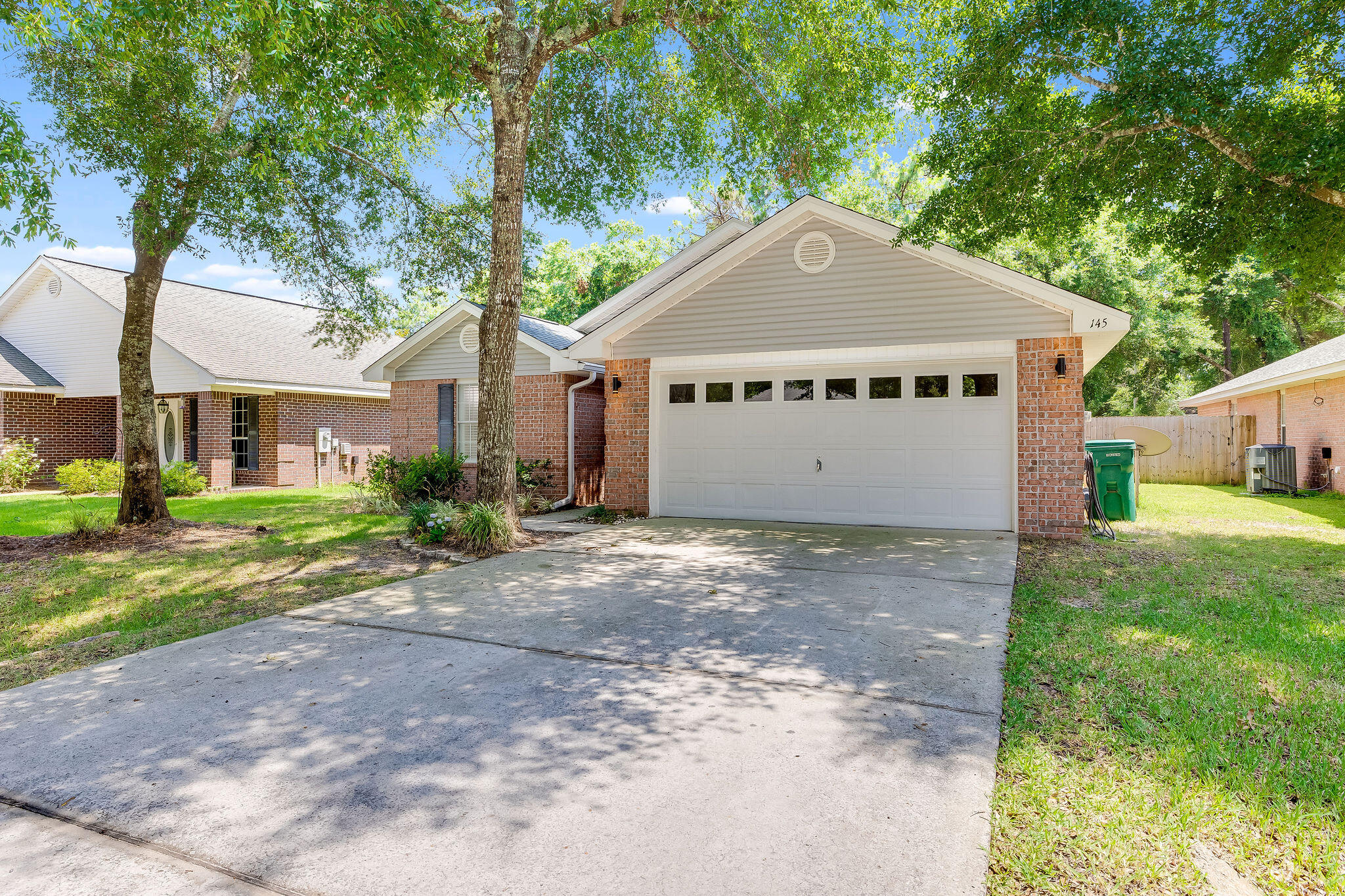 LUXURY HOME FULLY FURNISHED WITH UTILITIES INCLUDED! Perfect location close to Sandestin, Sacred Heart Hospital, Grand Boulevard, and the beaches of South Walton. This updated detached gem has fresh paint, new light fixtures & ceiling fans, and wide plank luxury LVP flooring throughout the entire home.  Updated chef's kitchen remodel features designer quartz countertops with waterfall edges, new cabinets and brand new appliances. Lots of storage in the spacious 2 car garage; along with a fenced-in backyard for complete privacy.  New A/C as of April 2024. Perfect home for a young family or medical professional seeking a quiet retreat close to shopping, entertainment, and outdoor activities.