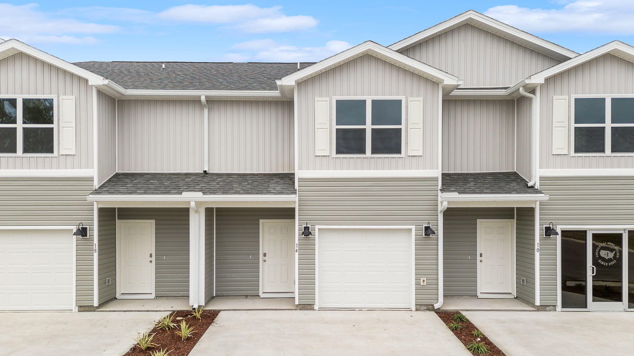 Welcome to 61 S Main Deck Drive at Genoa Landing Townhomes in Freeport Florida. This is an exterior unit that is located in a four unit building that is under construction. As you enter this townhome you will find a hall with EVP flooring that leads to an open-concept kitchen, living, and dining area, designed for entertaining and everyday living. The dining area is surrounded by windows that allow for natural light. The kitchen serves as the culinary center with its spacious center island and cabinetry for storage as well as a pantry. The kitchen has been appointed with stainless appliances including a stove, microwave and dishwasher and quartz countertops