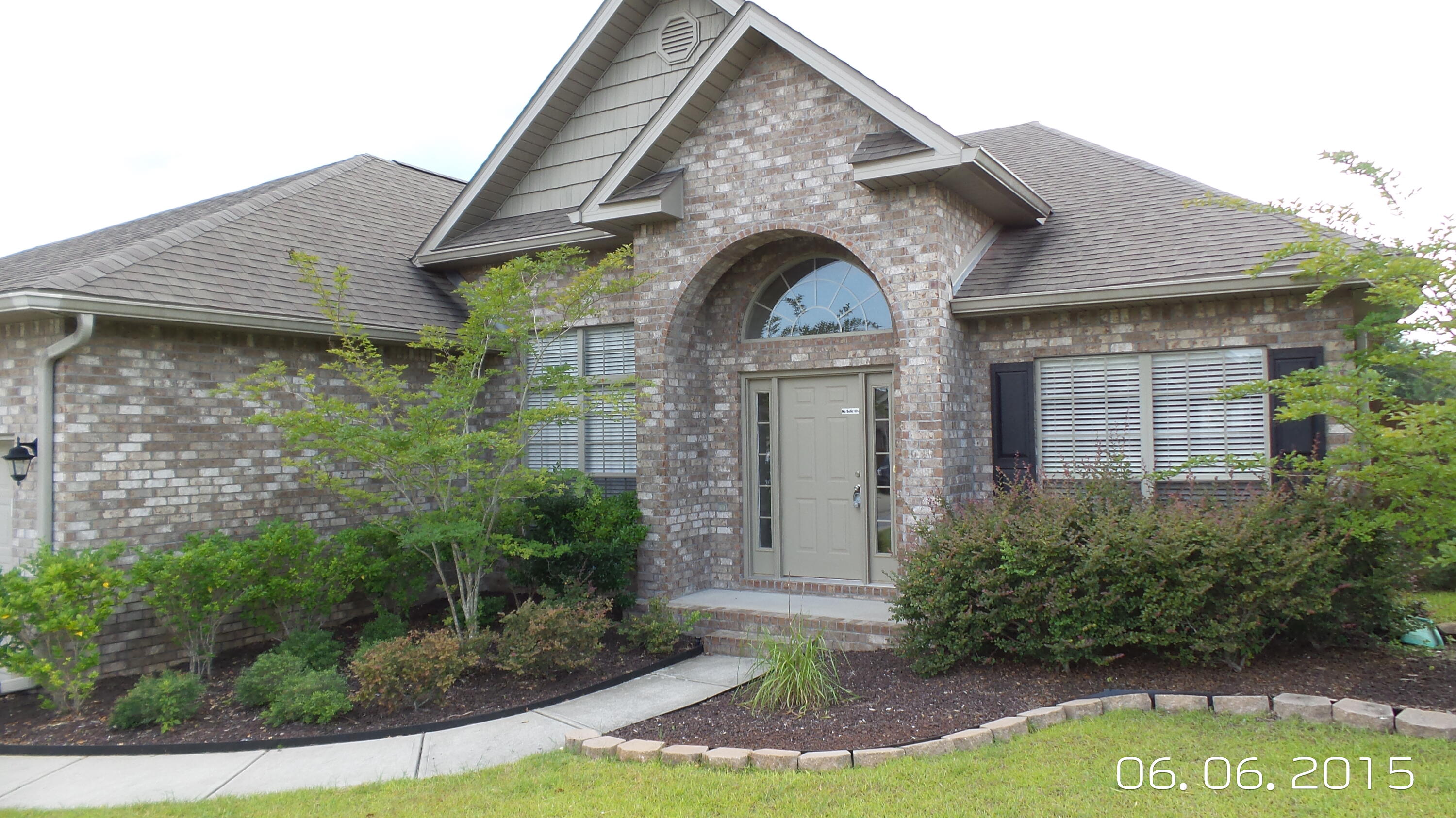 Highly desirable South of I-10 subdivision features this immaculate 3/2 floor plan with an office and formal dining area. Wood floors in the foyer, ceramic tile in the wet areas, accented archways, are just a few to mention. Large kitchen has eat in breakfast area, breakfast bar, new Samsung Air Fryer Stove. Neutral colors throughout the home. Vaulted ceilings, walk in closets, laundry room, double vanity in the master bath, garden tub, and separate shower. 2 car garage and mature landscaping. This home is perfect for outdoor entertaining with a spacious screened back porch and deck. This rental also includes a ''HOT TUB''......Pet friendly and large partially fenced back yard. No inside smoking.