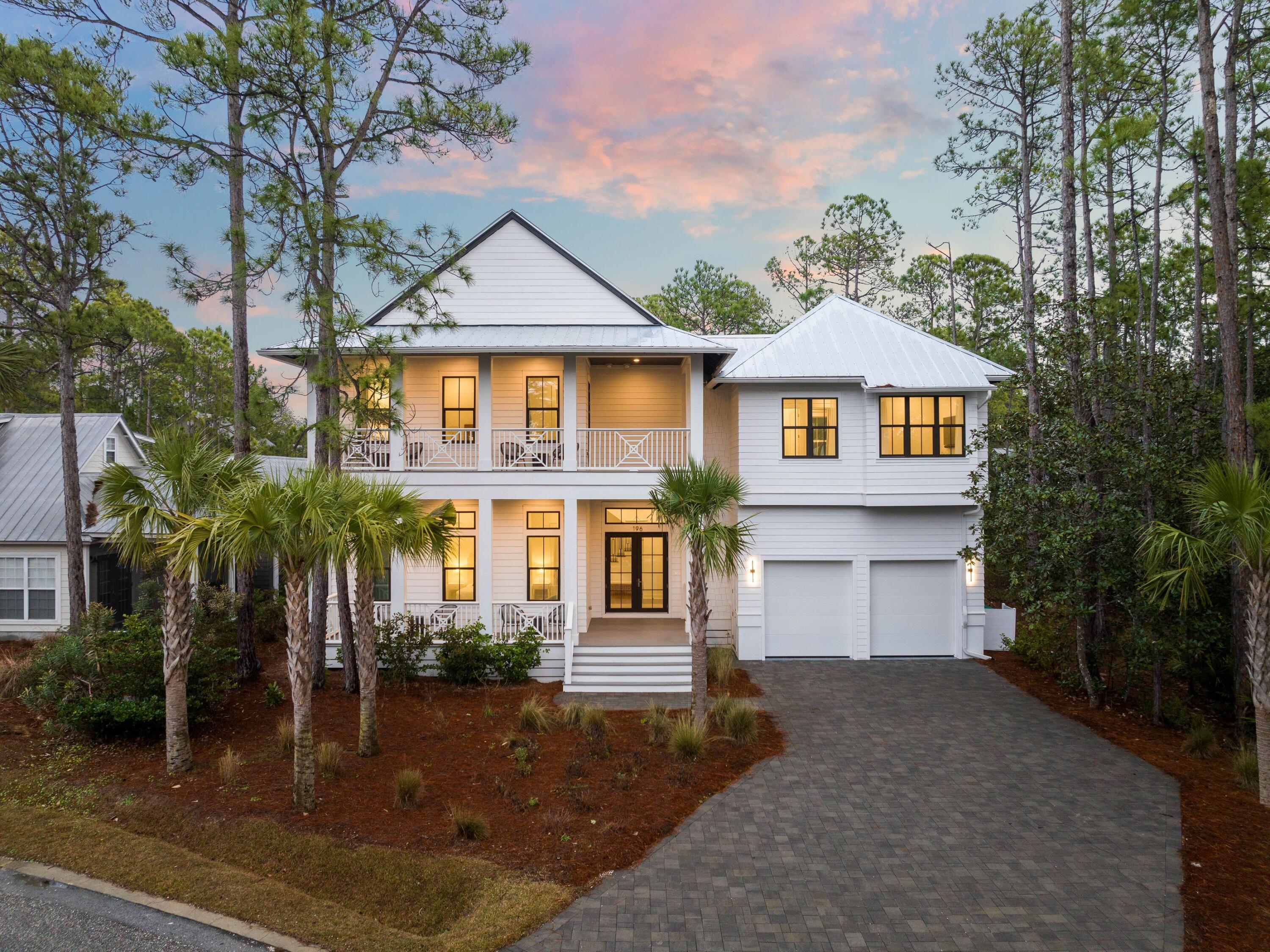 Welcome to 196 Wood Beach Drive, a newly constructed masterpiece in the coveted Sugarwood neighborhood of Santa Rosa Beach. Designed for both relaxation and investment potential, this exquisite 5-bedroom + bunk room, 6.5-bathroom home is an absolute gem along 30A.

Step inside to a seamlessly open-concept layout, where the living, dining, and gourmet kitchen blend effortlessly. High-end finishes, a massive kitchen island with breakfast bar seating, and custom designer furnishings exude coastal elegance. Every bedroom is a private retreat, featuring en suite baths, including five king master suites and a built-in bunk room with four twin beds—perfect for accommodating guests in style. Outdoors, indulge in resort-style living with a private heated pool, sun shelf, hot tub, and an outdoor kitchenall surrounded by multiple porches and patios ideal for entertaining or unwinding in the ocean breeze.

Located just a short stroll from the beach and the iconic town of Seaside, this home offers unparalleled beach access. Whether you're seeking a full-time residence, a second home, or a high-performing vacation rental, this property delivers. Currently managed by Southern Holiday Homes, it has a strong rental history, making it an exceptional income-producing investment.

As a bonus, the home conveys fully furnished and includes a 6-seater street-legal golf cart, ensuring effortless coastal adventures.

Don't miss your opportunity to own this slice of paradise in one of 30A's most sought-after communities!