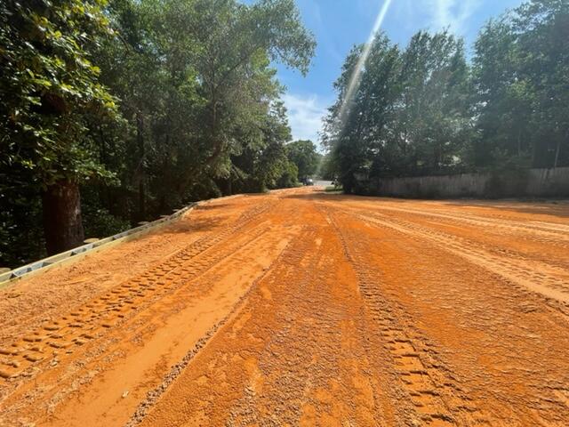 Back on market because buyers financing fell through.  Wonderful .35 acre lot located in Rockywood Estates.  Lot preparation is complete and ready for its new home!!  Seller had planned to build a home on this parcel but has moved out of the area and now decided to sell the lot.  The lot has a professionally engineered retaining wall and large mature trees.  This lot is centrally located to Eglin AFB and Duke Field, shopping, and just a few miles to the BEST Beaches in Florida.  Buyer is responsible for electric, water and sewer hook-ups.  Seller may consider financing assistance with qualified buyer.