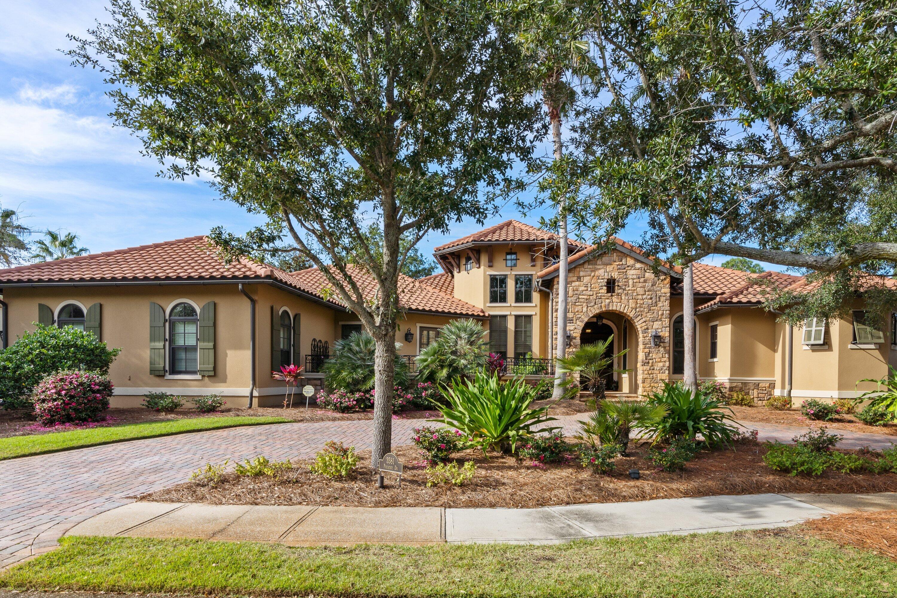 NEW PRICE!!!This 1 Story Lake Front Home is located in The Preserve in the Exclusive Gated Community of Burnt Pine at The Sandestin Golf & Beach Resort.
This Custom Home(Built with ICF Block)Overlooks the Lake and 4th Hole of the Burnt Pine Golf Course. The Open Concept Home has  3 Bedroom 3.5 bath plus Office. Home has Upgrades galore- Antiqued Travertine Floors, Custom Cabinetry, Reclaimed Wood Accents and Beams, Top of the Line Kitchen Appliances, 12 Foot Ceilings, Large Main Bedroom and Bath with 2 Closets and a Sitting Area with a Fireplace. Outside their is a Circular Drive along with an Outdoor Oasis in the backyard with a Magnificent View of Lake and Golf Course along with a Summer Kitchen, Fireplace, Fire Pit, Pool and Spa. INTERIOR OF HOUSE HAS ALL NEW FRESH PAINT.