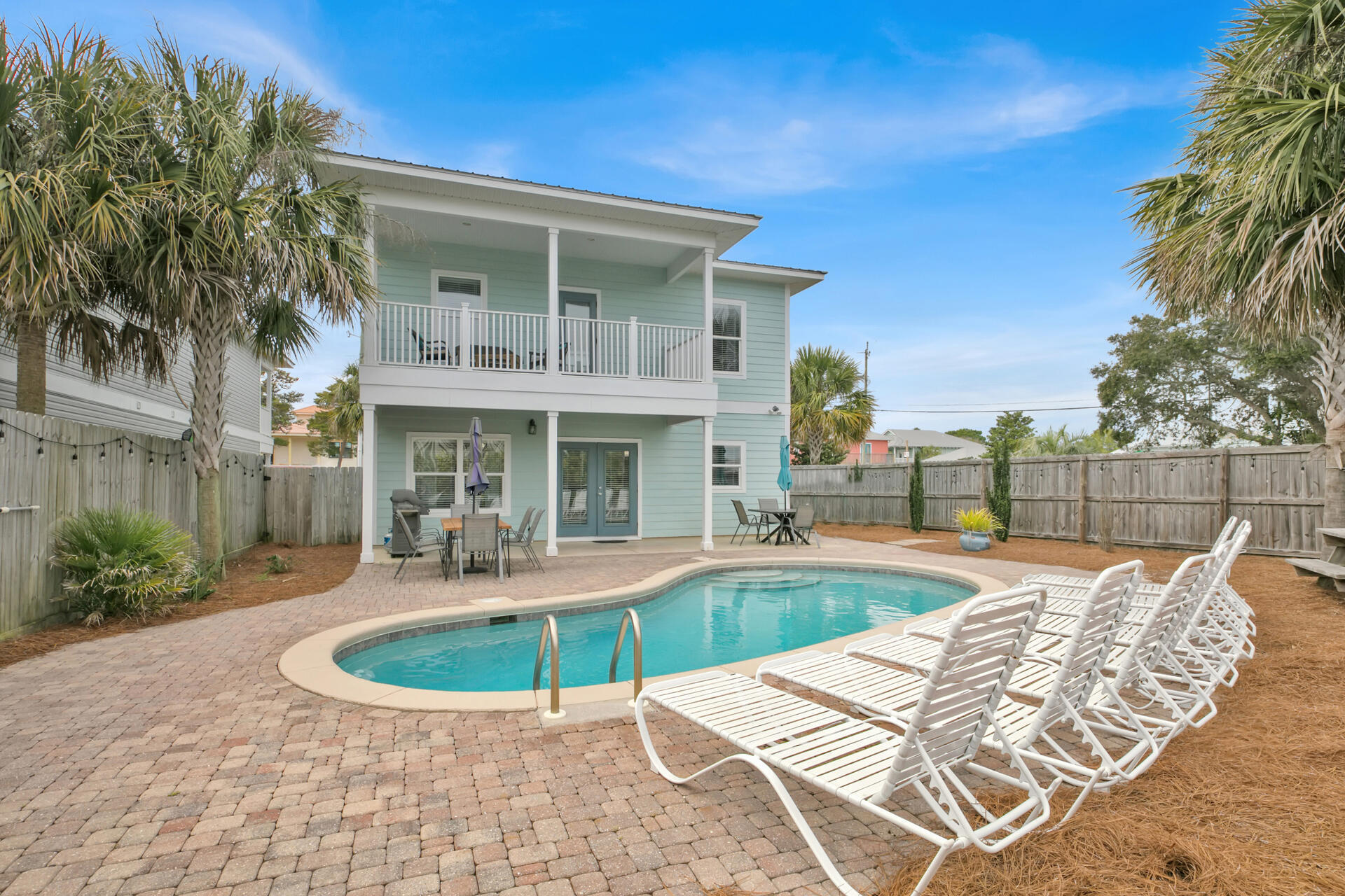 Yes, this one is what you've been looking for!  2022 bookings $202k(+). Ocean Kiss'd is located in Crystal Beach and situated on a corner lot just 2 blocks from the sugar white sand and the Gulf of Mexico. This home is convenient to restaurants, shopping and entertainment. With NO HOA restrictions the location makes it a wonderful opportunity to build a carriage house in the back. This 7 bedroom, 5.5 bath home has an open floor plan and lots entertaining areas.  Step outside and lounge around by the pool or enjoy a back yard BBQ.  Ample parking for guests. Heavily booked with consistently proven rental returns - you won't want this one to slip away!