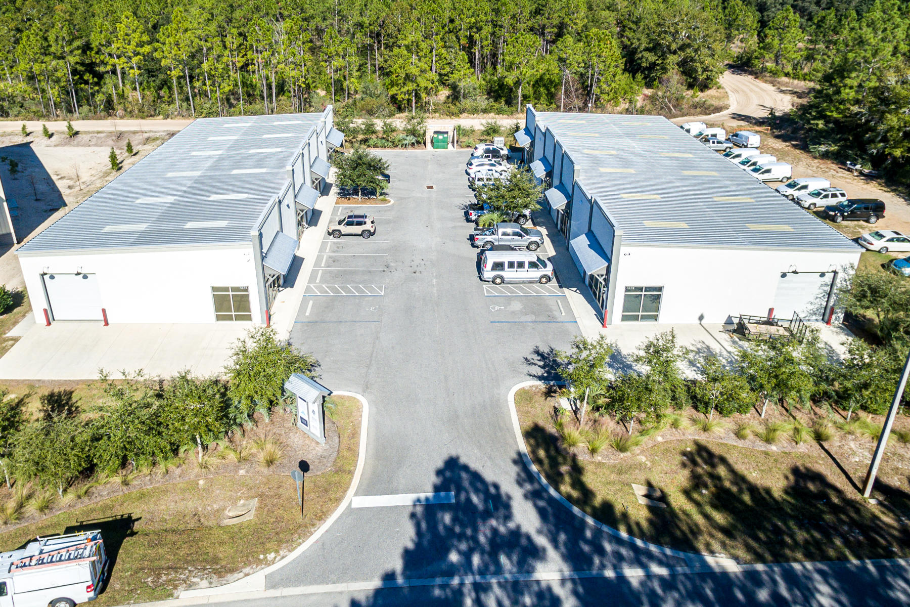 SIGNIFICANT PRICE REDUCTION! 13,600 SF of Superbly Constructed & Maintained Retail Storefronts, Offices, and Warehouses oriented on over 1 acre in St. Joe's South Walton Commerce Park of Santa Rosa Beach, Florida.  This new income-producing opportunity includes 2 buildings, Building A & Building B, 7,000 SF & 6,600 SF respectively.  Each building contains 4 demisable spaces, all 8 of which are 100% occupied.  This site will perfectly cater to St. Joe's 50-year growth plan, known as the Bay-Walton Sector Plan.  Please note the aerial photo illustrating the subject growth area.  This low-density commerce park is positioned effectively and logistically to support the Okaloosa, Walton, and Bay County markets, conveniently accessible to Interstate 10, and is located... approximately 25 miles to the Northwest Florida Beaches International Airport (ECP), 27 miles to Destin, and 74 miles to Pensacola, Florida.  Please inquire for further details.  The Buyer must verify the accuracy of all the information and specifications contained in this listing.