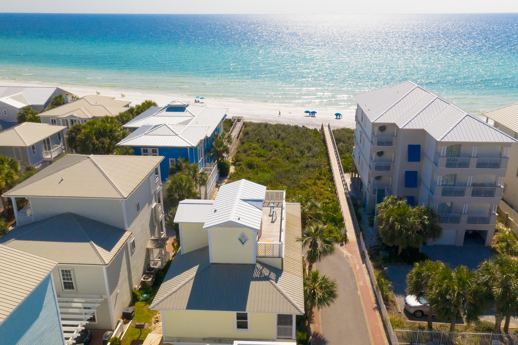 This charming three-story beach cottage in Seagrove presents like new, thanks to a recent makeover . Every floor of this well-located home has a covered terrace, deck or open balcony delivering unobstructed gulf views to captivate the eye. Fully furnished and professionally decorated by Bella Beach . Remodeling includes new flooring, countertops and freshly painted dcor complemented by modern bathrooms (all 5.5 of them). Five bedrooms, 4 of which are king-bed master suites, plus a bunk room with 1 queen and 3 twin xl, make this a popular home for entertaining or renting out when not in use by the owners. From the second floor master suite, your first view every morning will be of dazzling white sand lapped by azure waters sparkling in the morning sun. There is an expanded second master on the third floor with equally captivating views.The beach walkover is just 18 feet from the door. Days can be spent walking on the beach, sunbathing and generally de-stressing with a dip in a beautiful community pool just around the corner which is shared by just 11 neighboring beach homes. Evenings should be reserved for sitting back and toasting stunning sunsets that set the sky ablaze. This spacious home is set in a gated community which has carefully planned covenants limiting build height to preserve those all-important gulf views. Time out can be spent exploring Seagrove Beach with its shops and amenities or hiking in neighboring Deer Lake State Park. Whether you're looking for pizza, comfort food or freshly caught seafood, you'll find a selection of renowned restaurants and cafe nearby along Scenic 30A.