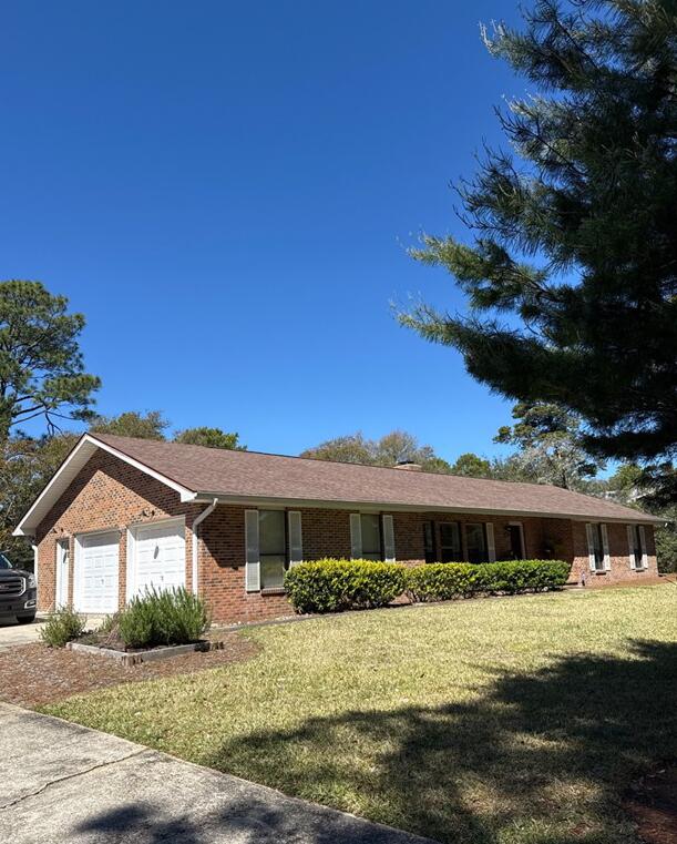 Charming ranch-style home on a spacious ½-acre lot, just a half mile from the Gulf of Mexico! Built in 1988, this inviting property blends classic character with coastal convenience. Enjoy single-level living with plenty of room to relax, entertain, or expand.