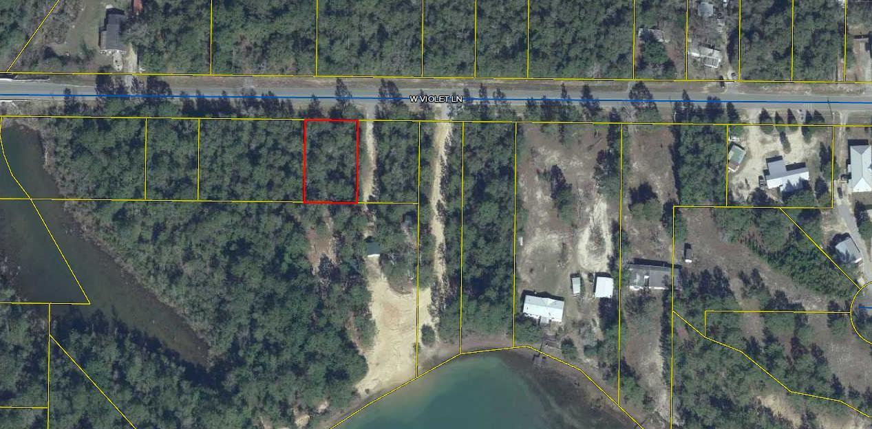 Beautiful wooded lot on paved road.  All woods across from property, almost private.  There is Beaver Lake nearby.
City water available.