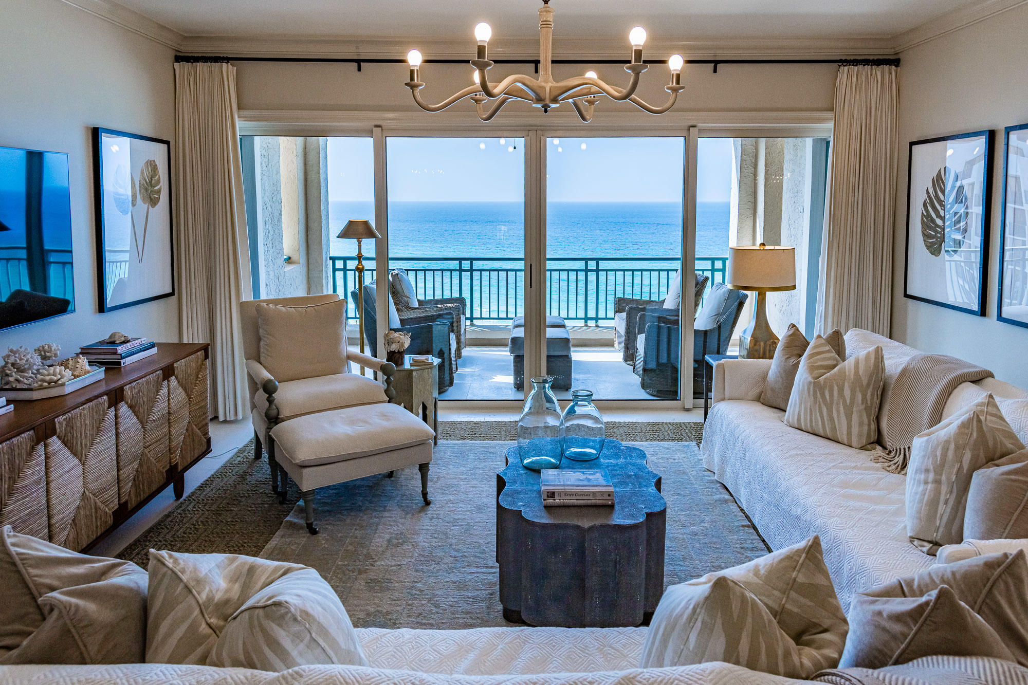Live the ideal beach life in this incredible 12th story luxury Gulf-front condominium located in Sandestin Golf & Beach Resort. The interiors were fully renovated by Erika Powell of Urban Grace Interiors and features custom lighting and high-end finishes throughout. The open-concept kitchen, living, and dining room layout are filled with natural light and provide an inviting space for living and entertaining. Step onto the spacious balcony overlooking the pool, beautiful beaches, and emerald green waters of the Gulf. The kitchen features marble counter-tops, custom built cabinets with plenty of cabinet space, designer backsplash and breakfast bar. This gourmet kitchen also features a farmhouse sink and stainless-steel appliances such as: Subzero refrigerator, Wolf cooktop/oven and microwave drawer. A long with an Asko dishwaser, Scotsman icemaker and Miele built-it coffee machine. The Gulf-facing master suite offers entry to the balcony with amazing views, large walk-in closet, and en-suite with dual vanities, soaking tub, and separate walk-in shower featuring Italian marble. The 2 spacious guest suites also offer stunning Gulf views.  This residence features crown molding and coral stone flooring throughout.  The condo building also has a water detection monitoring system that will shut off the water in the unit and notify maintenance if a leak is detected  an unique and very helpful feature.  Southwinds owners enjoy the privacy of living in a rental restricted building plus the amenities of the Sandestin Resort, including golf, tennis, biking, spa, beach service, and more.  Southwinds also has its own separate deeded beach access and is a non-rental community.