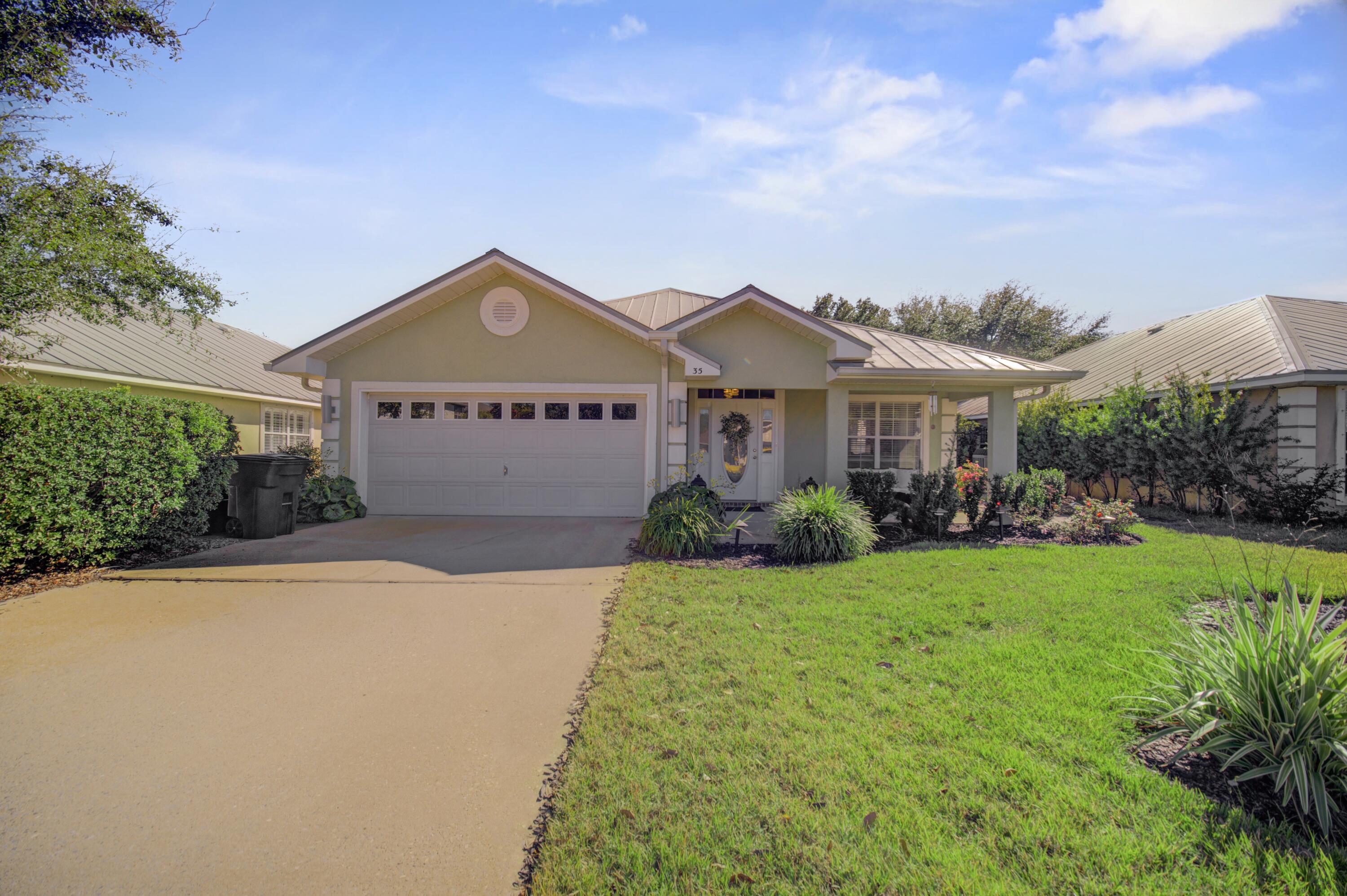 Set within the desirable Driftwood Estates community of Santa Rosa Beach, 35 Red Bay Court presents a rare opportunity to enjoy refined coastal living with a balance of style, comfort, and functionality. This thoughtfully designed single-level residence has been meticulously maintained and tastefully updated, offering a home that feels both elevated and effortlessly livable.

Upon entry, you're immediately greeted by a bright, open interior where natural light enhances the clean lines and modern finishes throughout. The main living space is expansive yet inviting, anchored by an open-concept layout that seamlessly connects the living room, dining area, and kitchen--creating a space ideal for both entertaining and everyday living. Durable luxury flooring and neutral tones provide a timeless backdrop, allowing the home to feel polished while remaining warm and welcoming.

The kitchen is a standout feature, designed to be both functional and visually appealing. Granite countertops, a classic subway tile backsplash, and abundant cabinetry offer ample workspace and storage, while the oversized breakfast bar serves as a natural gathering point for guests and family. Whether hosting casual get-togethers or preparing meals at home, this kitchen is built to accommodate it all with ease.

The home's split floor plan ensures privacy and balance, with the primary suite serving as a tranquil retreat. Generously sized and thoughtfully laid out, the suite offers a relaxing escape complete with a well-appointed en-suite bath and substantial closet space. The additional bedrooms are equally well-proportioned and versatile, ideal for guest accommodations, family members, or a dedicated home officeeach positioned to maintain separation from the main living areas.

Outdoor living is an extension of the home's thoughtful design. Step outside to a spacious deck and paver patio, offering multiple areas for dining, lounging, or entertaining. The fully fenced backyard is beautifully landscaped and provides a sense of privacy rarely found at this price point, making it perfect for pets, gatherings, or peaceful evenings outdoors.

Practical upgrades enhance the home's appeal, including a two-car attached garage, updated mechanical systems, and an option to purchase the property fully furnished and turn-key, allowing for a seamless transition into ownership. Whether moving in full-time or securing a second home near the coast, the ease and flexibility this property offers are undeniable.

Driftwood Estates further elevates the lifestyle with community amenities such as a resort-style pool, pickleball courts, and a playground, all while being ideally located just minutes from the sugar-white beaches, dining, shopping, and entertainment along Scenic Highway 30A.

Whether envisioned as a primary residence, a coastal retreat, or a high-performing investment opportunity, 35 Red Bay Court delivers understated luxury, exceptional livability, and an unbeatable Santa Rosa Beach locationa home that truly stands apart.