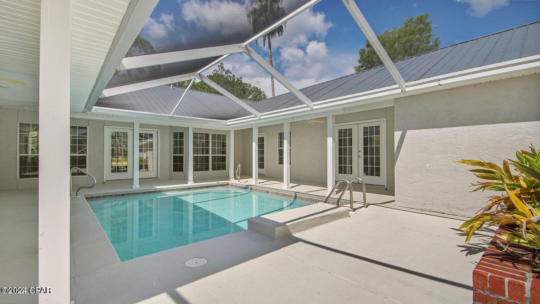 FOR LEASE $4,700 per MONTH. Lawn and Pool Maintenance included. ABSOLUTELY SPECTACULAR, RECENTLY REMODELED HOME, located in the coveted Colony Club near the Legacy Golf Course. Opulence, class, and sophistication abound with an amazing center courtyard pool perfect for entertaining family and friends. Boasting 4 bedrooms (one of which could be used as a second master suite), 3 bathrooms, this Colony Club masterpiece is full of comfort, style, and space with 2288 square feet and ample screened-in outside entertaining space featuring a 15.5 X 18.8 inground pool. This fantastic home features a new metal roof, a split-bedroom floor plan, a , large eat-in kitchen with views of the enclosed pool, beautiful accent lighting, new luxury vinyl flooring, freshly painted walls and trim all nestled on an oversized lot featuring a long (135) foot driveway offering plenty of parking. You will absolutely love the Colony Club community and Legacy Golf Course. Pet Deposit $400.00 Non-refundable