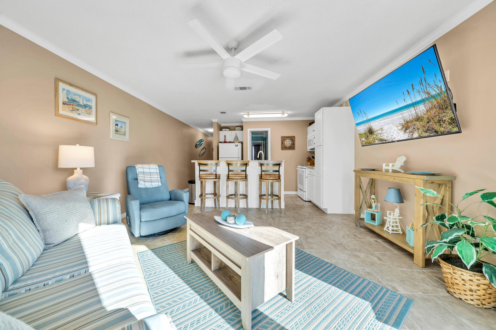 BEST PRICED CONDO at GULFVIEW! w/ more to offer! Come see this beautifully appointed & decorated- fully furnished 1 bedroom condo that features hall bunks & a sleeper sofa allowing the unit to comfortably sleep 6. The main bedroom features a Queen size bed, TV & crown molding. The kitchen is fully equipped, offering an open floor plan to the beautifully decorated living room. Direct access to the beach via private gated boardwalk, to enjoy miles of pristine beaches. Condominium features a heated pool & heated hot tub, BBQ grilling area, & w/n minutes of shopping, restaurants & entertainment. Turnkey ready for rental, 2nd home or your forever home. This unit has a side balcony. Bathroom remodeled 2021-$10,200. PGT vinyl impact sliding glass door w/ Low-E Max Argon Gas installed 2021-$3995.