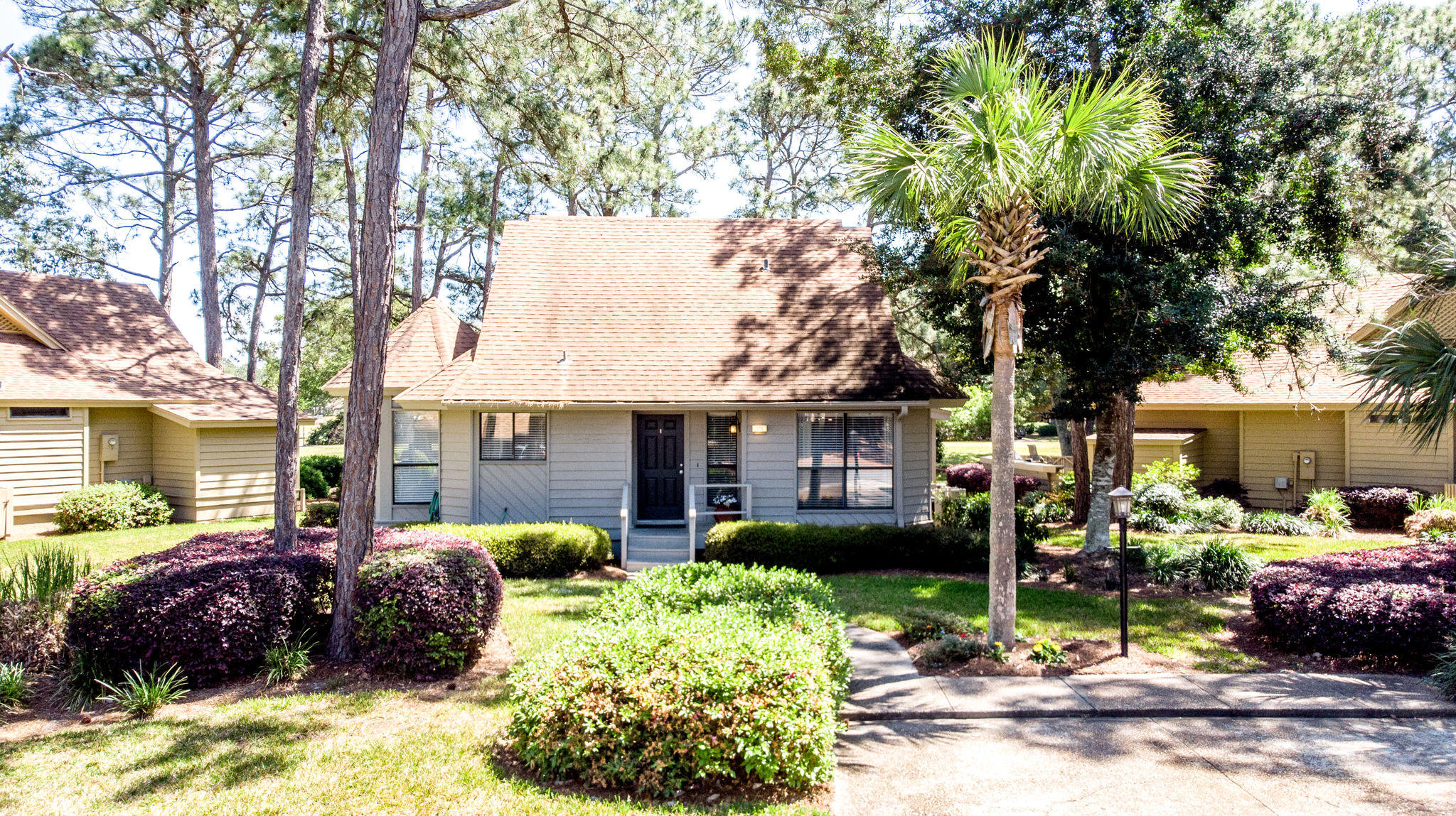 Enjoy the resort lifestyle in this delightful, updated cottage on the Links Golf Course within a highly sought after gated beach community . Whether you are looking for a vacation home, investment property or a full time home, this is a must see! Updates throughout including well-appointed kitchen, baths, exterior space including screen porch, spacious patio and large storage closet. This beautiful home boasts 2 bedrooms and baths on the main level. Upstairs the master bedroom suite is ready to relax with sitting area, balcony for enjoying the views, extra closet space and bath with walk-in shower. Seller also owns garage directly across from home. Will consider selling also. The Sandestin Golf and Beach Resort is a 2000+ acre resort with amenities that include a beautiful beach four championship golf courses, full service marina, tennis facility, nature trails, bike and walking paths, restaurants, daily live entertainment, shops and much more.