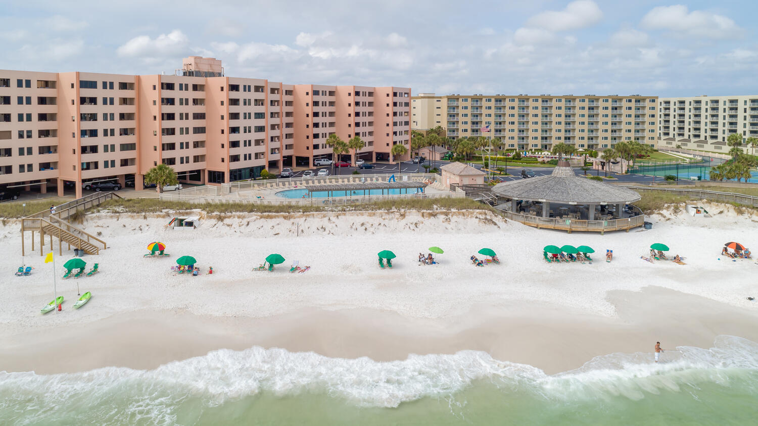 Jetty East is a Gated 6-story midrise with under building parking located on the beautiful sugar sand beach in Destin, Fl. The location is unique as it is located on Holiday Isle (Gulf Shore Drive) which ends at Destin Harbor.  It's great for biking or walking. The jetties of the east pass make a great spot to snorkel or fish from the jetties.   Jetty East is one of the few condos to offer covered parking.  The required Milestone Study and Structural Reserve Study were completed mid-summer. There was an assessment August 1, 2024, for replacing the building sky light and has been completed.   Unit 516A is a very light and bright unit with large tile flooring and luxury plank in the bedroom.  Granite counter tops in the kitchen with a new refrigerator.  Great views from the unit and balcony Gross Rental income ranges from $35000 to $45000. 
The unit features EFCO (category4) sliding glass doors and windows paid for by the seller.  Approximately $20,000 value.  Begin and end each day enjoying spectacular morning views of the Gulf of Mexico. Enjoy evening sunsets and seasonal fireworks from the beach. Great location for shopping, grocery stores (New Publix) and restaurants. Jetty East Amenities: 900 feet of beach, 2400 sq. ft. pool with sun deck, hot tub, beach side pavilion with charcoal grills, tennis courts, pickleball, fitness room, kids' activities, music entertainment, shuffleboard, covered parking, 24-hour security. Nice owners room with full kitchen for meetings or parties.  Financing Note: Jetty is a Non-warrantable/ Condotel.   No conventional (government backed Fannie or Freddie) financing.