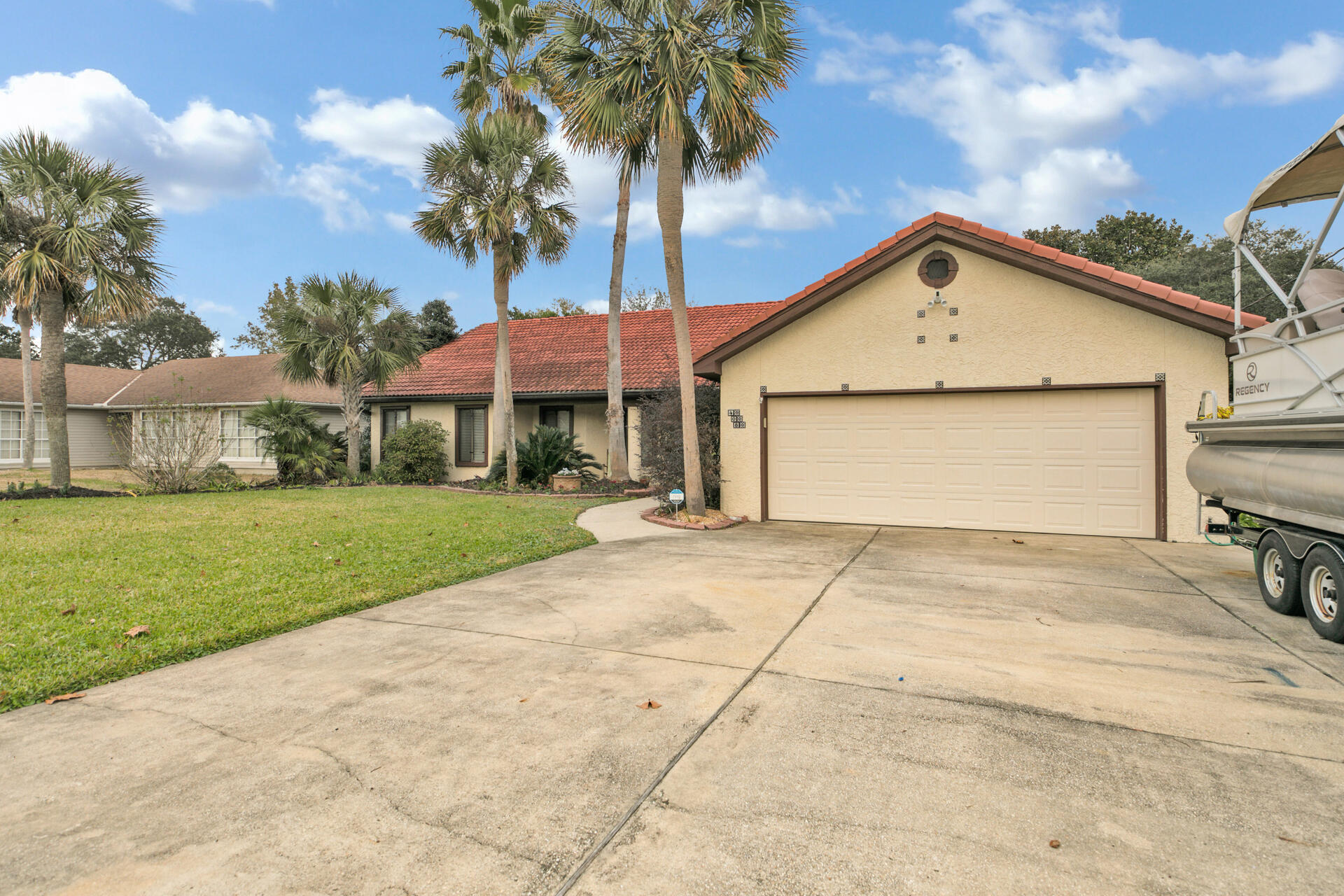 Beautiful Spanish inspired home located in the well established neighborhood  of Kell-Aire Gardens in Destin is ready for a new owner. This spacious 3 bedroom, 3 bathroom home features vaulted ceilings and tile floors throughout. The kitchen is equipped with new stainless steel appliances and upgraded countertops. The home features a bonus room that has its own entrance and bathroom, which could be used as an additional bedroom or office. The home has a screened-in porch overlooking the salt water pool. There is an enclosed 2 car garage with plenty of storage space plus an additional space to park your boat or RV.