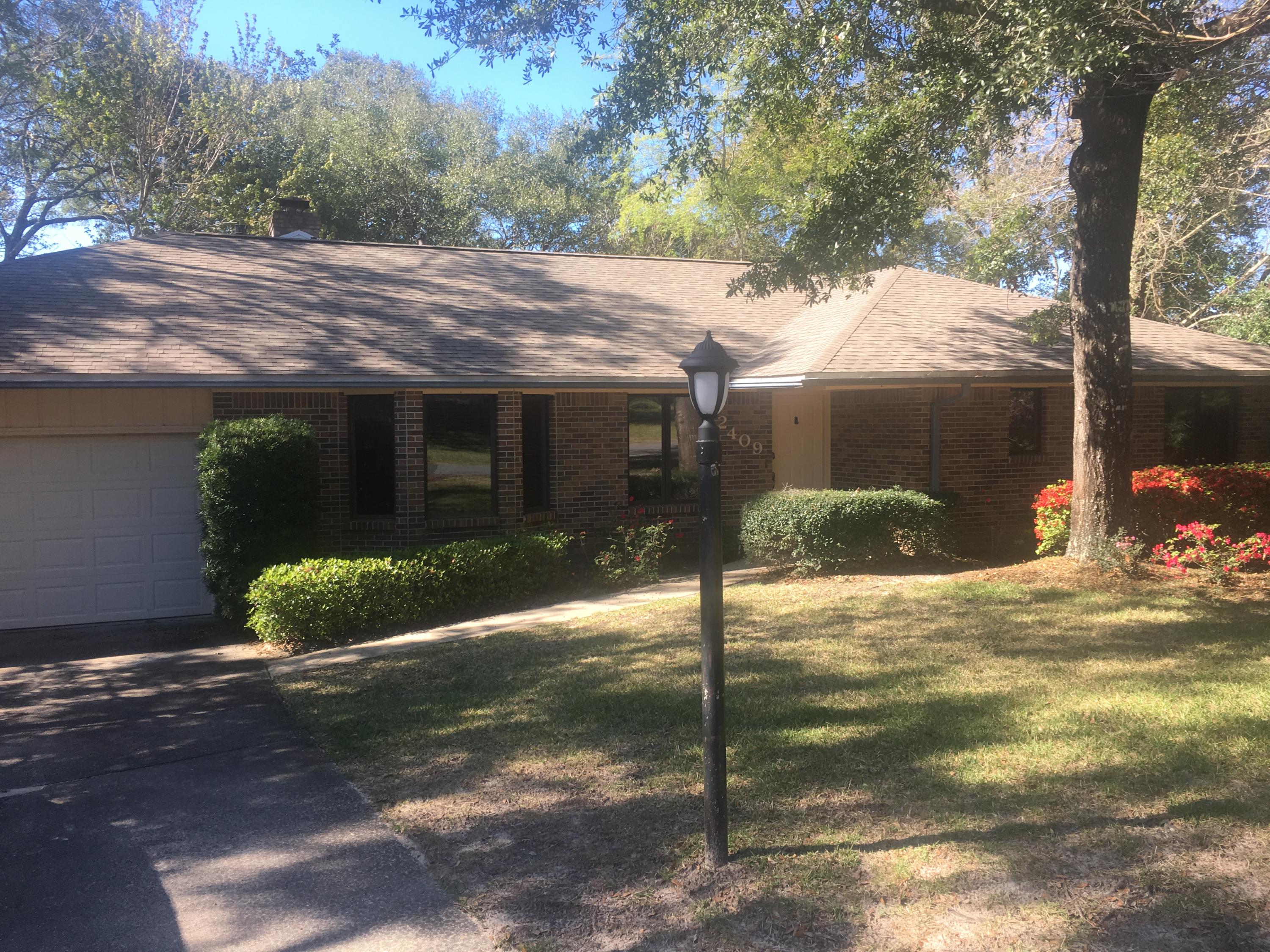 Home is on supra key. This home is a two bedroom but it does have an additional room off the family room for a office. It does not have a closet but could be used for a additional bedroom. Home has wood flooring and tile in the bathrooms, formal dining, office and kitchen. Home has two walk in showers and two bathtubs. All windows have window treatments. Kitchen has breakfast bar. Great location close to everything in Niceville. Large kitchen with formal dining room. Family room with fireplace. Neutral paint throughout the home. Laundry has additional sink and toilet. Enclosed screen porch overlooking the creek. Single story. Apply at rentspree.com. Cost is $39.00 to apply.