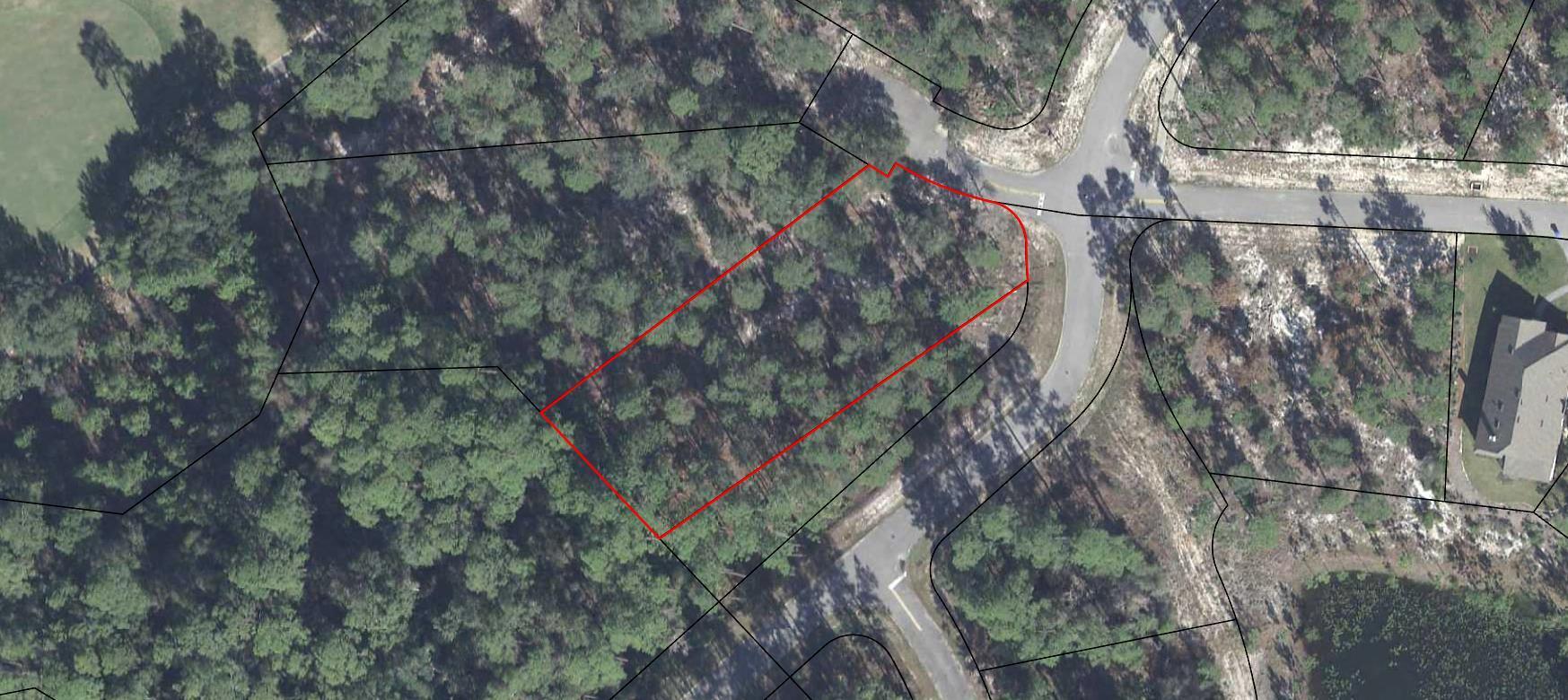 This incredible over-sized lot features a large area of open space on one side of the property as well as in the rear making the property feel even larger and is located on a small cul de sac! The seller has plans approved by the Wild Heron ARB for a 3 bedroom, 2 bath home with an office, (3,889 SF) with a screened pool, lanai and a 3 car garage. Residents at the Wild Heron community have access to Lake Powell, one of the largest of the rare coastal dune lakes in the region. The community has a boathouse stocked with canoes and kayaks for exploring the pristine waters, which run all the way to the Gulf of Mexico. For golf lovers, the centerpiece of the community is the award-winning Shark's Tooth Golf Course and Club, located alongside the lake and designed by one of alongside the lake and designed by one of the world's best golfers, Greg Norman. Residents also have access to a pool with a children's area and a hot tub, a community fire pit and a health and fitness club. If water is your love, you will be able to fish, crab, boat or sail to your heart's content...or spend the day lounging on some of the world's most beautiful beaches, approximately 2 miles away. The opportunities for outdoor exploration, relaxation and fun in the Wild Heron community are truly limitless. The coastal sanctuary community of Wild Heron is conveniently located between Pier Park and the east end of 30A. The opportunity to build your dream home awaits!