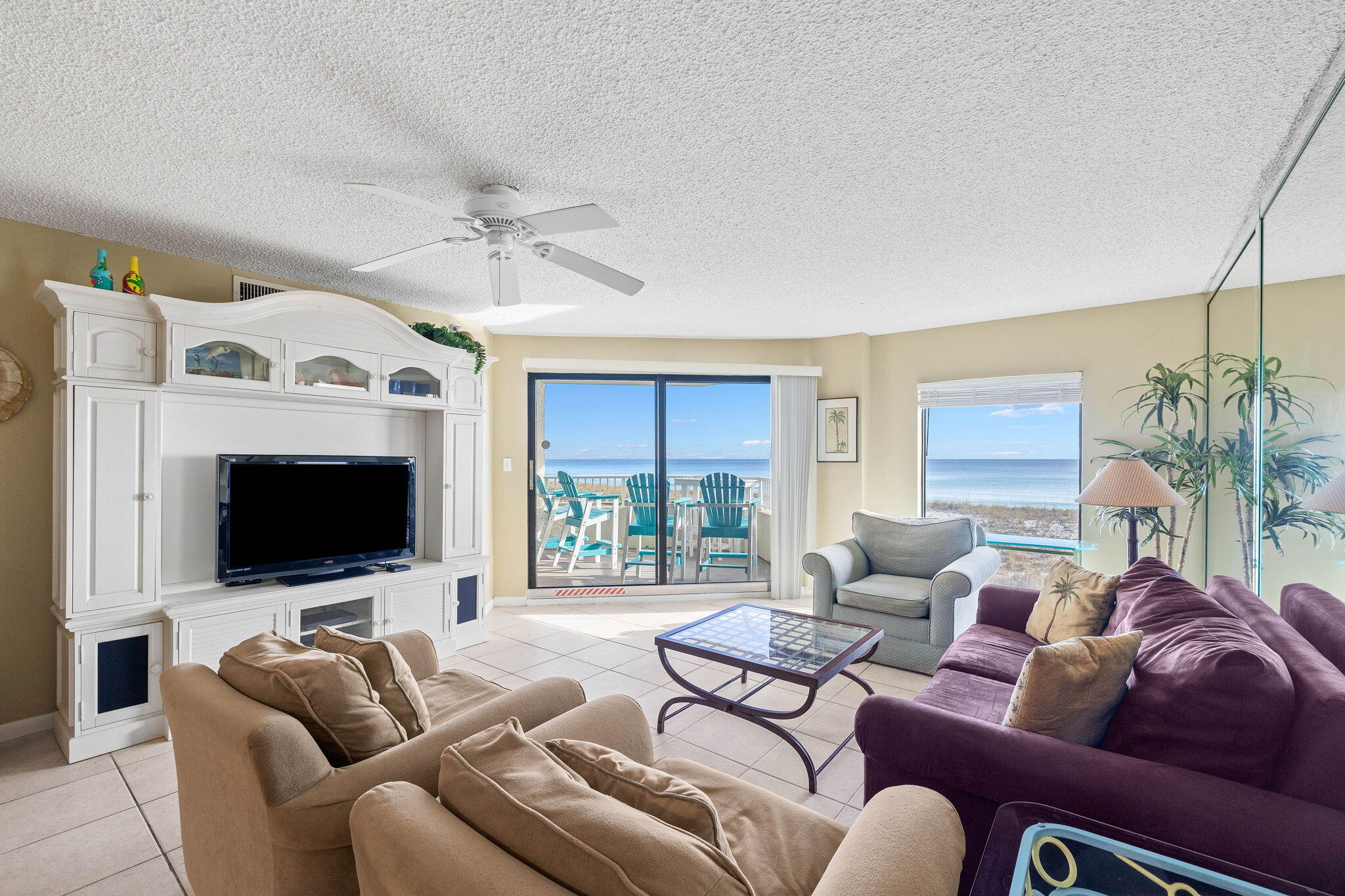 Discover true beachfront living in this charming 1st floor condo with fantastic Gulf views!  Although it is on the first floor, the elevation above the parking area ensures unobstructed views of the Gulf! No need to take the elevator when you're steps from the sand and pool! There's an opportunity to enhance the unit by converting the breakfast nook into a charming bunk room, as seen in other units. By purchasing this two-bedroom condo and creating an additional bedroom, you can significantly increase its value! Enjoy a spacious open floor plan that flows into an outdoor terrace, perfect for enjoying your morning coffee and cocktails at sunset. Upgrades in 2024 include new carpet in bedrooms, new A/C, new Stainless steel appliances, and washer and dryer. Premium amenities at Inlet Reef Cl lub include a large gulf-front pool, beach chair service, lighted pickleball & tennis courts, shuffleboard, full gym, covered owners parking, guest parking, and owner's storage closet for all your beach items. This serene beach retreat would make a great permanent residence, second home or a fully furnished turnkey rental investment! This property is a must-see, offering everything you desire in a coastal getaway!