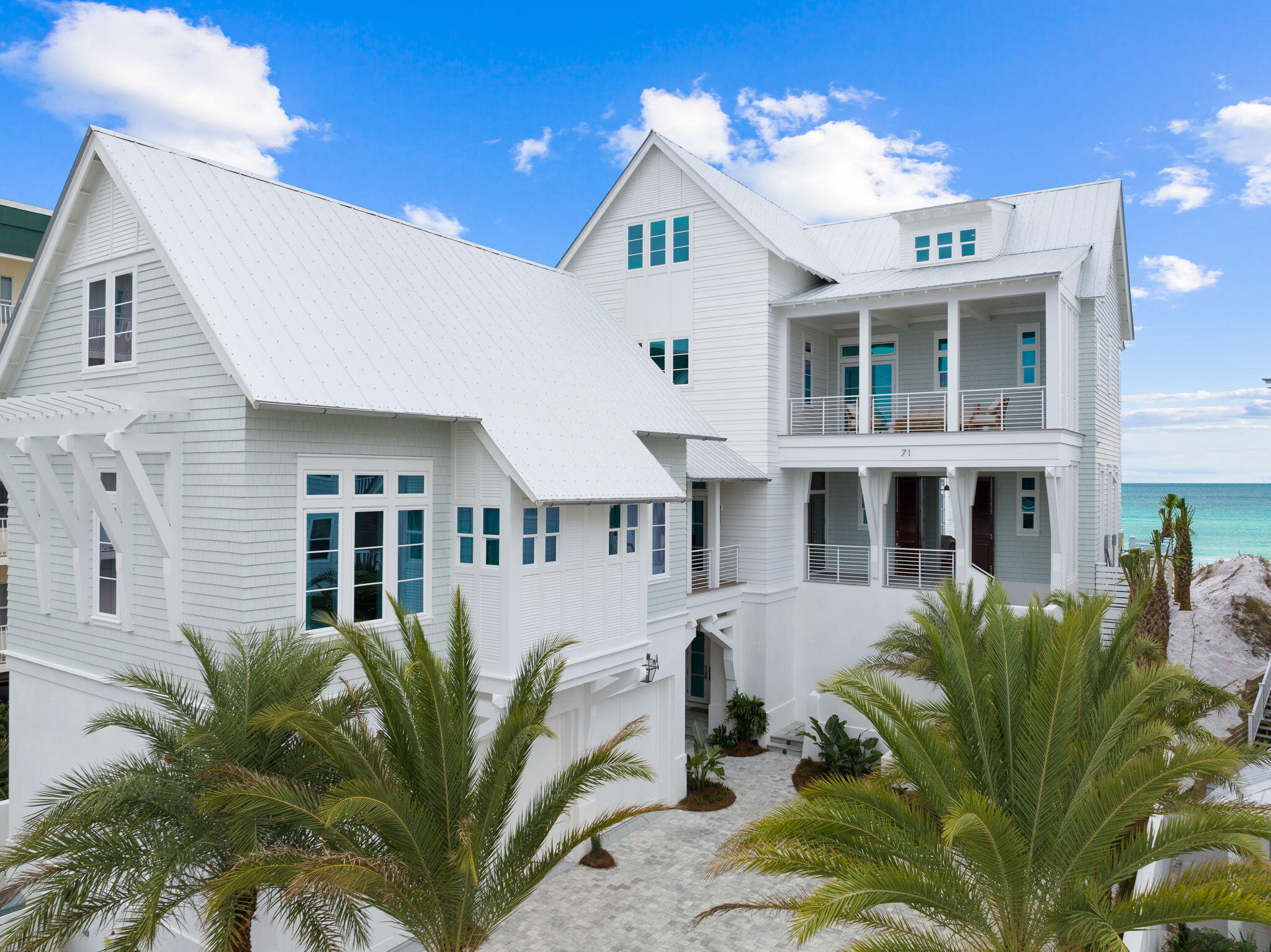 A Gulf-Front Legacy Estate on Scenic 30A!
Introducing 7,911-square-foot of Gulf-front masterpiece set along the pristine white sands of Florida's Emerald Coast. Designed by renowned architect Geoff Chick and impeccably curated by celebrated interior designer Ashley Gilbreath, this extraordinary residence captures the essence of refined coastal living in the heart of Seagrove Beach. Spanning four levels and encompassing eight bedrooms and eleven baths, this private estate offers a rare balance of secluded retreat and grand-scale entertaining. With 68 feet of coveted private Gulf frontage, every day begins with the gentle rhythm of waves and ends with sunsets that paint the horizon in breathtaking color.
The outdoor experience is nothing short of spectacular. A heated saltwater pool over- looks the Gulf, creating a serene vantage point where sky and sea converge. Expansive terraces invite effortless entertaining, while a fully appointed outdoor kitchen sets the stage for elegant alfresco dining beneath the stars. A three-car garage and charming carriage house add both convenience and versatility to this remarkable coastal sanctuary.
Exterior: Coastal Architecture at Its Finest
Set on an expansive 0.6-acre Gulf-front homesite, this four-story architectural statement blends timeless coastal elegance with modern luxury. Its commanding presence is balanced by natural textures and thoughtful design that harmonize with the surrounding seascape.
Outdoor living takes center stage, with sweeping terraces that extend the home's living spaces toward the horizon. The heated saltwater pool glistens against the backdrop of emerald waters, offering year-round enjoyment in a setting that feels both tranquil and grand. From sunset gatherings around the outdoor kitchen to quiet mornings overlooking the Gulf, every exterior detail has been crafted to elevate the experience of beachfront living.
Interior: Curated Luxury and Timeless Design
Inside, the home unfolds into a world of refined sophistication and effortless comfort. The interiors, masterfully curated to reflect a seamless blend of classic elegance and contemporary coastal style. With over $1 million invested in furnishings and design, the residence is offered fully furnished, delivering a move-in-ready experience worthy of its remarkable setting.
The second floor serves as the heart of the home, where a stunning chef's kitchen and expansive living area flow effortlessly onto Gulf-front terraces, the pool, and outdoor kitchen--creating a seamless connection between indoor and outdoor living.
Above, the third-floor primary suite offers a private sanctuary suspended above the shoreline. Floor-to-ceiling views of the Gulf create a serene retreat where luxury and nature exist in perfect harmony.
The fourth floor offers another sitting area, private junior master suite with Gulf views and a game room/workout room with lots of storage and additional space. Every detail throughout the residence--from bespoke finishes to panoramic coastal vistas-reflects an unwavering commitment to craftsmanship, design excellence, and uncompromising quality.
More than a residence, this is a generational coastal estate--an opportunity to own one of the most remarkable Gulf-front homes along Scenic 30A.