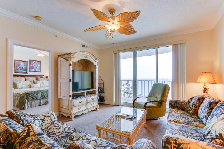 Your own private assigned under-building parking space! This beach inspired Gulf front 2/2 condo at Emerald Isle is the beach getaway you have always dreamed of! Riveting Gulf views are framed by beautiful interiors, designed with the Gulf of Mexico and sun in mind. Unit will convey fully furnished and rental ready! The gourmet kitchen features granite counters and loads of cabinet space and is fully stocked and rental ready. This condo lives large and is spacious and bright! Master bedroom on the Gulf with access to the balcony through sliding glass doors. Gulf views from master bedroom, living room, dining area, & kitchen! Sunshine and warm gulf breezes abound from HUGE (10X28) BALCONY offering panoramic views as far as you can see to the East and West and providing the