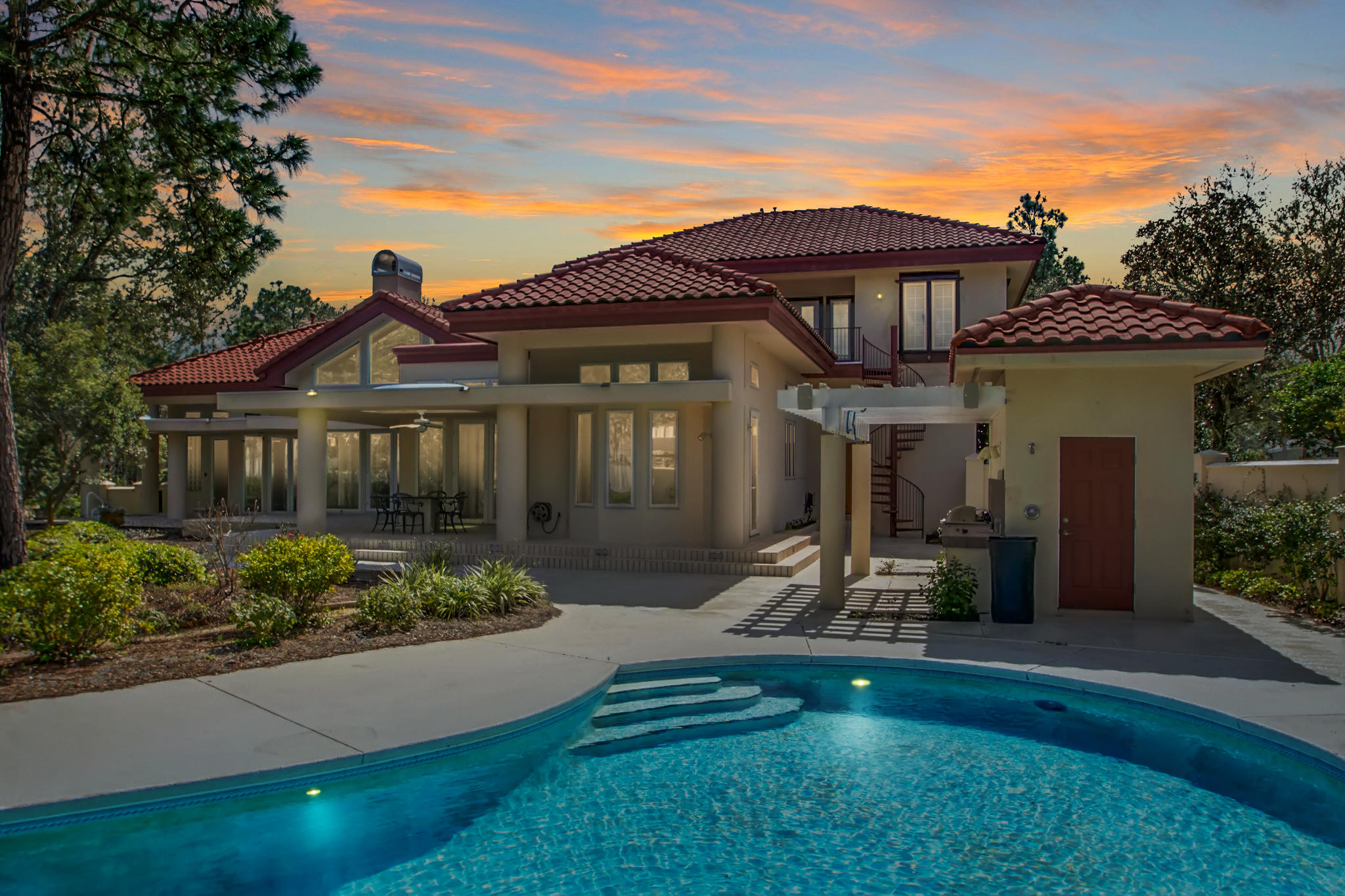 Unique architectural estate home located on largest waterfront lot in Emerald Bay. This home has a media room, 2 additional studies & 2 half baths. Private heated pool, sun deck, hot tub, out door kitchen +cabanas, 182 ft dock w/covered sitting area. BONUS 2-bedroom/2 full bath guest apartment separate from main living space. Stainless steel appliances, granite counters + marble floors, gas fireplace + custom aquarium.
Property being sold 'As IS''