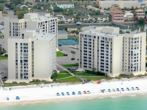 Enjoying the fabulous beach lifestyle is easy when you own at Shoreline Towers. Take in the big Gulf of Mexico view from you private 7th floor balcony.Your location is just a shell's throw from the famed shopping, dining, entertainment, golf and spas the Emerald Coast is known for. Shoreline Towers is tucked away in a gated community - enjoy the heated swimming pool, tennis court, fitness room, owners lounge and gated security with 24 hour patrol. Plenty of room for the whole family and rental ready. Granite counter tops and tile floors make this condo pop. Separate storage room for all your beach toys. There is even room available to park your boat. Crab picture does not convey with sale. Buyer to verify all information.