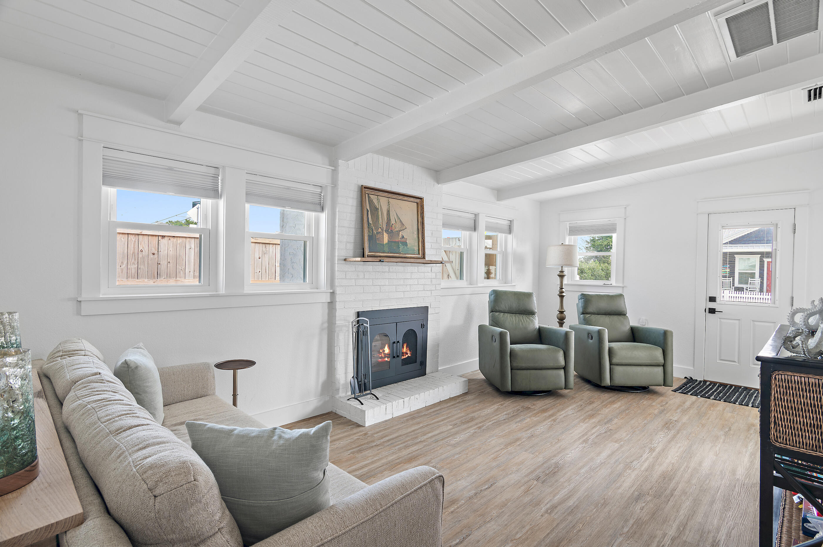 Beautifully remodeled Laguna Beach getaway just two blocks from the Gulf! This spacious and inviting single-level, fully furnished home sits on a fenced double lot and has been completely updated with attention to every detail. Inside, you'll find custom built-in closets, updated lighting, new cabinetry, stainless steel appliances, new flooring, new roof, and new windows throughout. The bright, open layout includes multiple living areas — a cozy family room with fireplace and blackout shades for movie nights, plus a sunny Florida room perfect for morning coffee or afternoon relaxation. With three bedrooms and two beautifully renovated bathrooms, the home comfortably accommodates family and guests. Two bedrooms feature king beds, and the third offers a full-over-queen bunk. The sunroom includes a daybed for extra sleeping space or a peaceful reading nook.

Step outside to a large fenced patio with grill, perfect for entertaining or unwinding after a day at the beach. Additional highlights include RV hookup, golf cart, ample parking, and a pet-friendly yard.

Ideally located near Thomas' Donuts and Carousel Grocery, this property is just a short walk, bike, or golf cart ride to convenient beach access points and the scenic bike path connecting to Pier Park and 30A. Whether you're seeking a primary residence, second home, or excellent rental investment, 325 Coronado Place offers the perfect blend of comfort, style, and location in one of Laguna Beach's most desirable areas.