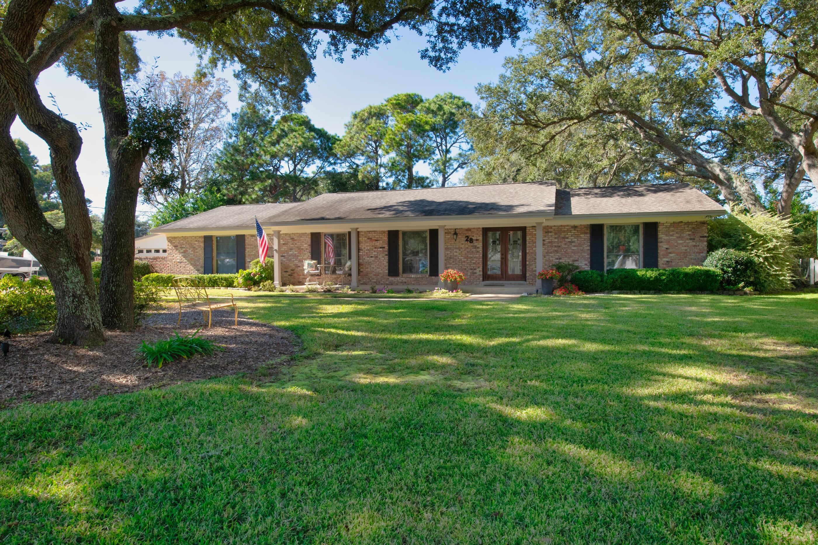 Welcome to 28 Country Club. Having undergone in a full remodel in 2008, not a detail was overlooked. Timeless finishes and quality materials have been chosen to ensure endless life in the design of this home. Immacute records have been maintained for the new owner. From the large open concept gourmet kitchen and living area, to the split floorplan and dual master suites both with their own entrance to the courtyard this home is ideal for hosting parties. 28 sits well off Country Club Road and is designed to ensure lots of usable backyard space. Mature oaks adorn the front yard and hedges of Hydrangeas and other beautiful foliage surround the house. The backyard overlooks the 8th tee of Shalimar Pointe Golf Course and offers plenty of room for an in-ground swimming pool. The additional.... climate controlled 2 car garage offer plenty of secured parking. The extra large driveway would easily accomodate many cars, a boat, and an enclosed trailer. Have a glass of wine or bourbon while you savor the sunsets from the courtyard. Enjoy the benefits of living on Shalimar Pointe Golf Course without the restrictions and HOA fees. 

FEATURES: 
Natural gas range and gas grill.

The house is plumbed for gas hot water heater and gas heat. 

Roof 2012. 

6 year Terminix termite bond started May 2019. 

Existing survey available.

Remodel records and other info available in docment section.