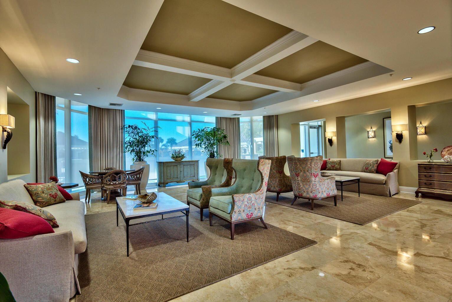 This beautifully decorated, stunning 2 bedroom 2.5 bath water view unit will dazzle you and I promise, it will NOT disappoint the most discriminating buyer!  The unit is immaculate and has had a complete makeover in 2020.  The tastefully done kitchen has KitchenAid stainless appliances and quartz countertops. There are custom, electric shades in bedrooms and living area and the bedroom shades are black out shades.  The bathrooms are beautifully  decorated with quartz countertops.  The lovely, high-end furniture and decor will convey with the unit!  This unit includes a deeded golf cart, garage space (#4) in the brand new golf cart parking garage.  As an added bonus, the seller will be including her 2017 Tomberlin, 6 passenger golf cart, with Bluetooth Bazooka sound system, LED lighting and upgraded, large, steel wheels.
     The unit has one deeded parking space (#97) in the covered garage.  There is electrical access in this parking space.  Buyers will also have access to their own storage cage, (#53). 
     All measurements and dimensions are approximates and buyer should do their due diligence.