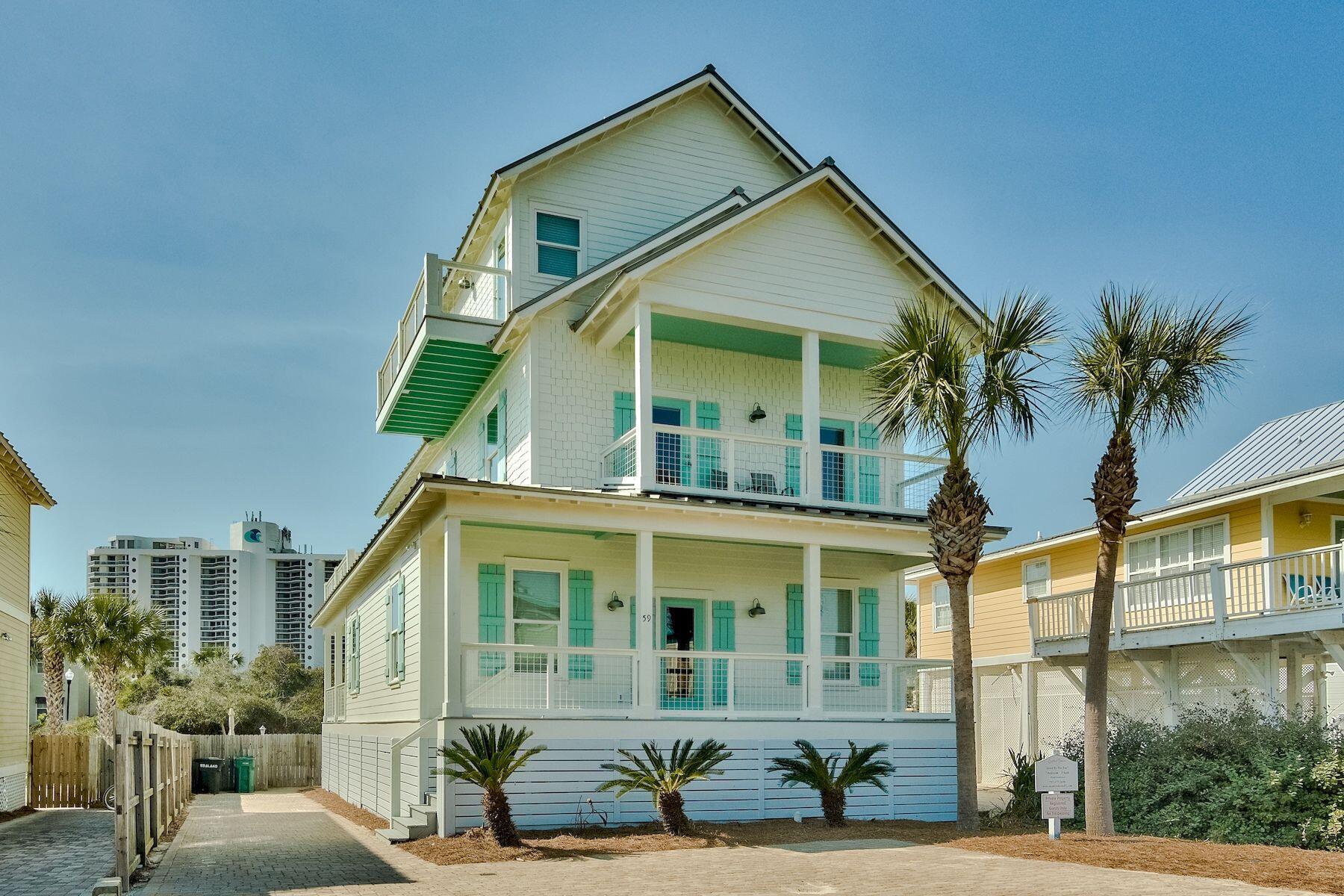 This rental machine is one of the best options on the market today for investors looking for solid ROI figures. 59 Alamo currently boasts over $167,000 in gross rentals for 2021 with additional weeks still available to book up. This incredible beach house was built for entertaining and is located just 3 lots from the deeded beach access for Alamo Street homeowners. All three floors offer access to the scenic outdoor views or the Gulf of Mexico via private balconies or porches. Parking is plentiful and proximity is ideal for those who like to walk to local restaurants or ride bikes down the beachside path. The dual master suites are an added bonus for anyone who wishes to have ample sleeping space along with the convenience of ensuite bathrooms. The additional bedrooms provide plenty of... space for multiple different sleeping configurations to accommodate many guests comfortably. The entrance to the home through the large open kitchen flows from the dining area all the way through the living room, out to the backyard oasis where you'll find the private swimming pool with a wooded view, a privacy fence, and a grill area, perfect for summer barbecues and enjoying the blissful Florida sunshine. This home will not last long, so call today for more information or your private viewing.  All room dimensions to be verified by the Buyer.