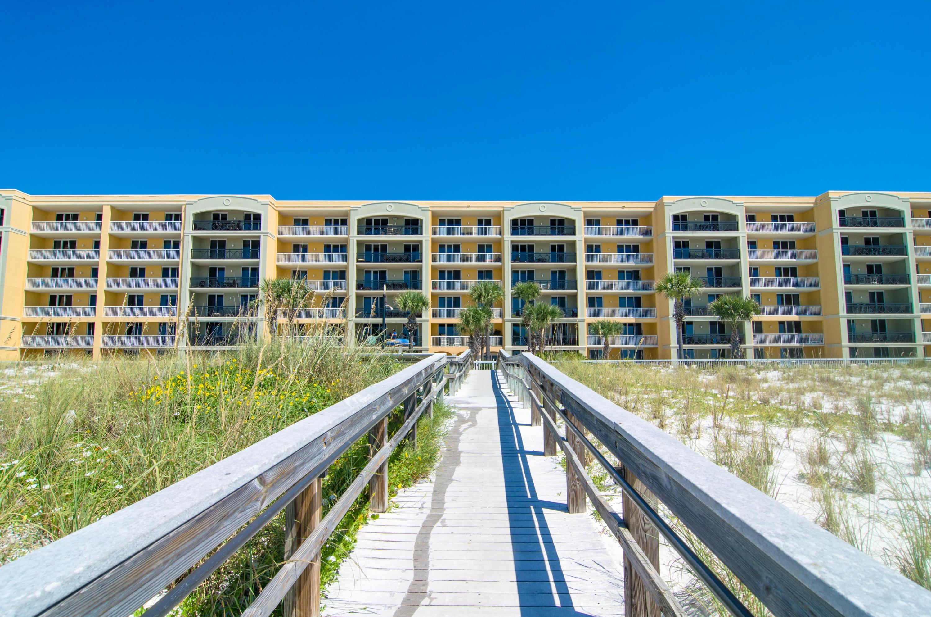 Coastal luxe living at its finest in this 2nd stack coastline view 3 bedroom condo at Azure. Upgrades include new wood floors throughout the ENTIRE CONDO (no carpet), stainless steel appliances, granite counters, beautiful furnishings and a large balcony to soak in all the views. The Master Suite is Gulf front and has balcony access plus a spa-like bath with jacuzzi tub, and separate shower. Imagine one of the area's most luxurious condominium complexes with every amenity desired including 2 pools, 2 hot tubs, a spray park, fitness center and a large boardwalk to access the beautiful beach. This is a turn-key property - all you need is your bathing suit!