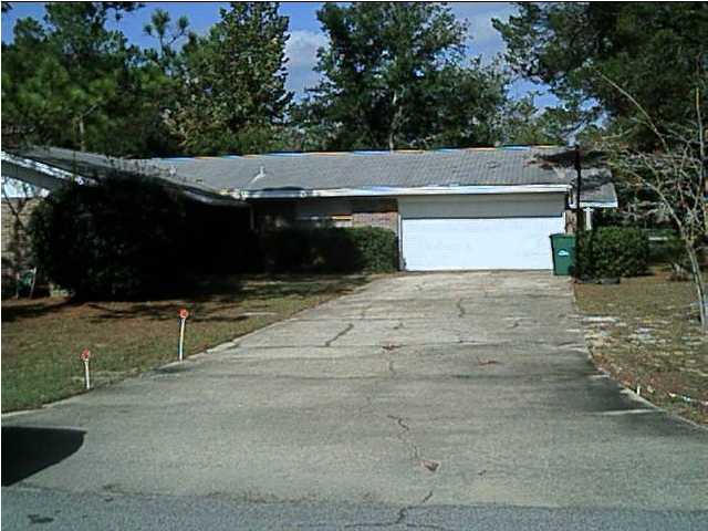 REMODELED HOME IN A GREAT LOCATION AND ONLY MINUTES FROM EAFB. CLOSE TO SCHOOLS AS WELL, IN FACT YOU CAN WALK TO THE ELEMENTARY SCHOOL. IT IS IN A VERY QUIET WOODED AND FAMILY FRIENDLY NEIGHBORHOOD. THERE IS A NEIGHBORHOOD PARK WITH BEACH AND BOAT RAMP ON POQUITO BAYOU. THIS HOUSE BOASTS LOTS OF ROOM INCLUDING A SEPERATE LIVING ROOM, DINING ROOM AND FAMILY ROOM WITH FIREPLACE. THE BACKYARD IS FENCED AND A GOOD SIZE WITH A COVERED PORCH FOR YOUR ENTERTAINING. YOU WILL HAVE TO SUPPLY YOUR OWN FRIDGE AS THE HOME DOES NOT COME WITH ONE. THERE IS CERAMIC TILE IN THE KITCHEN, FOYER LIVING, DINING AND FAMILY ROOMS, UPDATED COUNTERTOPS SINK AND CABINETS IN THE KITCHEN AND BATHS. LARGE 2 CAR GARAGE LAUNDRY HOOKUPS ARE IN THE GARAGE. MAKE AN APPOINTMENT TO COME SEE TODAY.