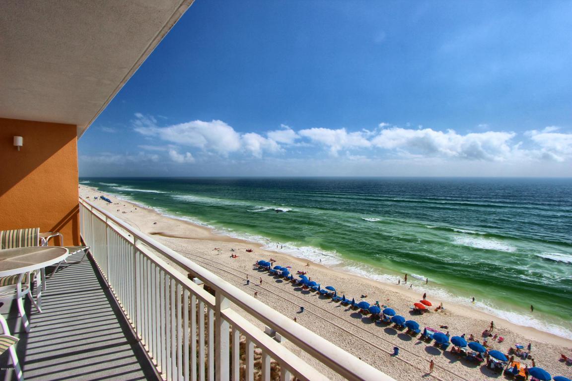 Perfect elevation within the stack! Conveys fully furnished! If you are looking for a TOP rental income producer, you have found it here at Splash! This beach inspired 3 bedroom, 3 bathroom LOCKOUT end/corner location condo features 3 balconies and has riveting Gulf views from every window! This condo has so much flexibility and can be rented as a 3/3 or a 2/2 + 1/1 - or rent half and use the rest for yourself while still collecting the best rental income on the beach. *Rental income in these lockouts are $60,0000-$75,000 annually!!!* Three spacious bedrooms include a Gulf front master suite with balcony, a guest bedroom with a private Gulf front balcony and a third suite with Gulf front balcony, kitchenette and bathroom. This unit has bunk beds and sleeps 11! The spacious kitchen features slab granite counters and breakfast bar. An open and spacious floor plan is decorated with the beach and sun in mind. Unit is tiled throughout and conveys fully furnished. Splash - is one of the top rated beach resorts in Panama City Beach and offers amazing resort style amenities including: water park - kids' pool park with waterslides, interactive water toys, a lazy river ride, ''dive-in'' movie theater, arcade, state of the art fitness center, a pool and Jacuzzi just for the adults and a poolside bar and grill. All this plus covered garage parking, a beach apparel/surf shop and on-site rental management & check-in desk.