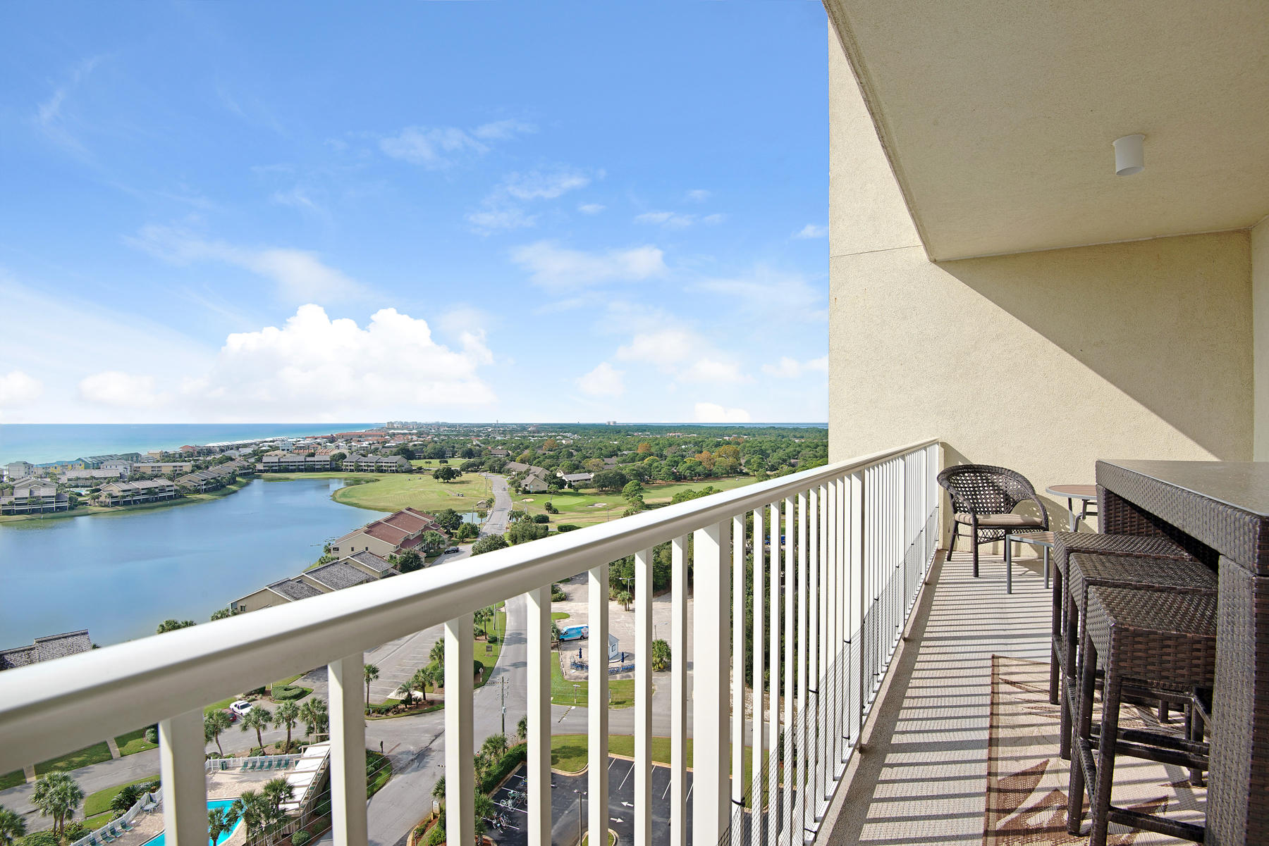 It's a Knockout!! This unit has an incredible views of both the Gulf and Lake. The current owners spared no expense to put the very best finishes in the unit and have furnished it exquisitely. Upgrades include: Santa Cecilia granite counter tops, stainless appliances, Autumn kitchen cabinets, Moen fixtures, state of the art ceiling fans, and Crown Molding galore. As you enter the condo you'll pick up the beautiful blue/green waters of the gulf against the smooth, dark wooded living area flooring leading out to a full size balcony. Enjoy all the great amenities that this gated community has to offer with 2 of the largest pools in the area,a fully equipped fitness facility,Cabana Caf restaurant,golf and tennis as well as deeded beach access to over 2,000sqft of beautiful white